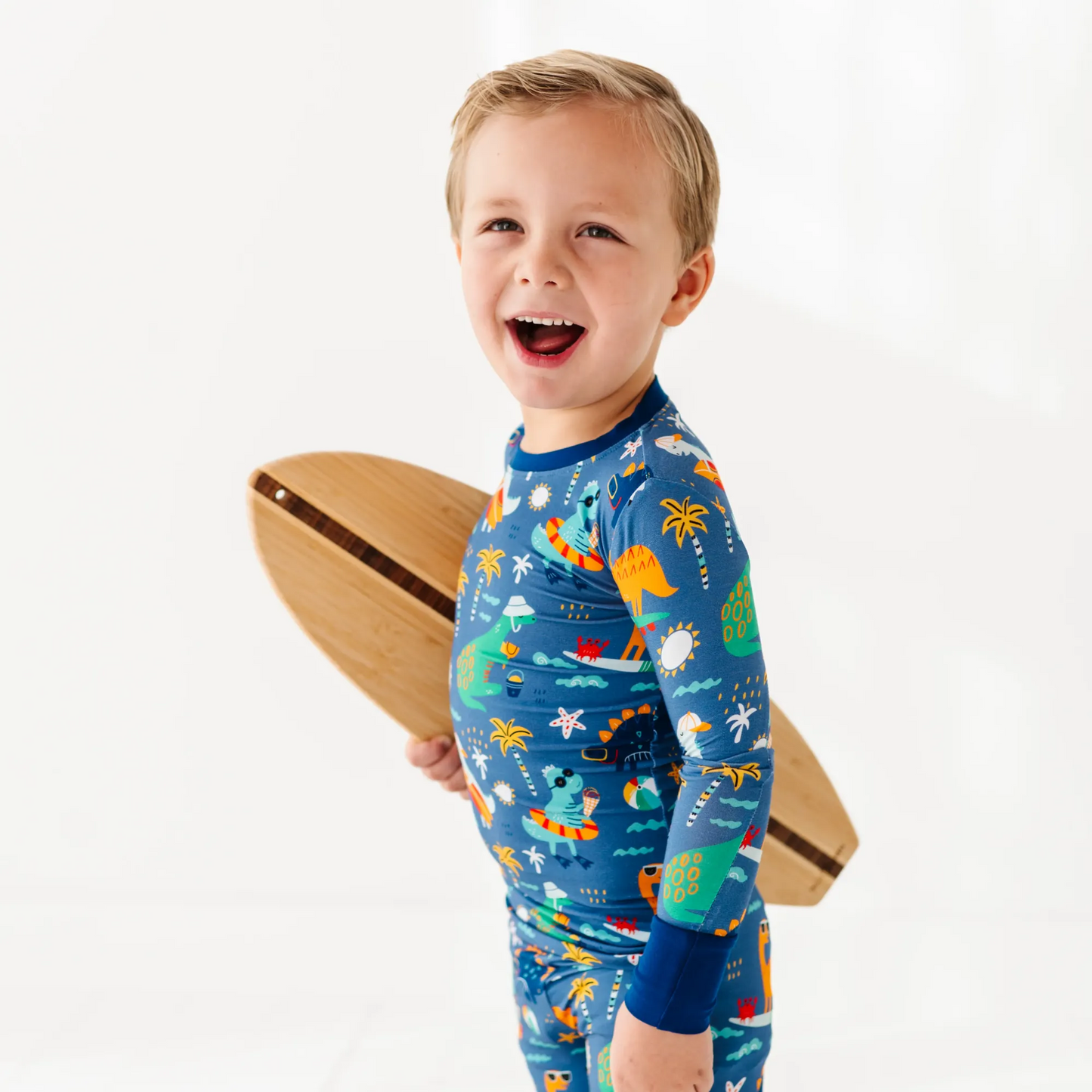 Blue dinosaur bamboo pajamas by Kiki and Lulu