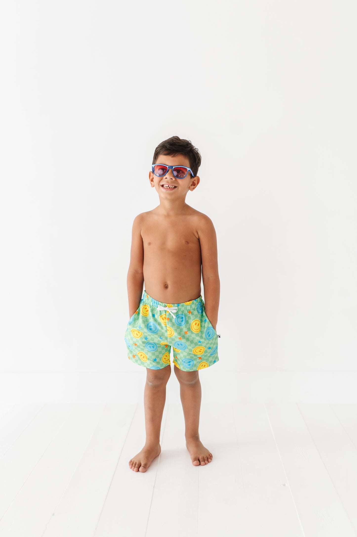 Electric Smiles Swim Trunks