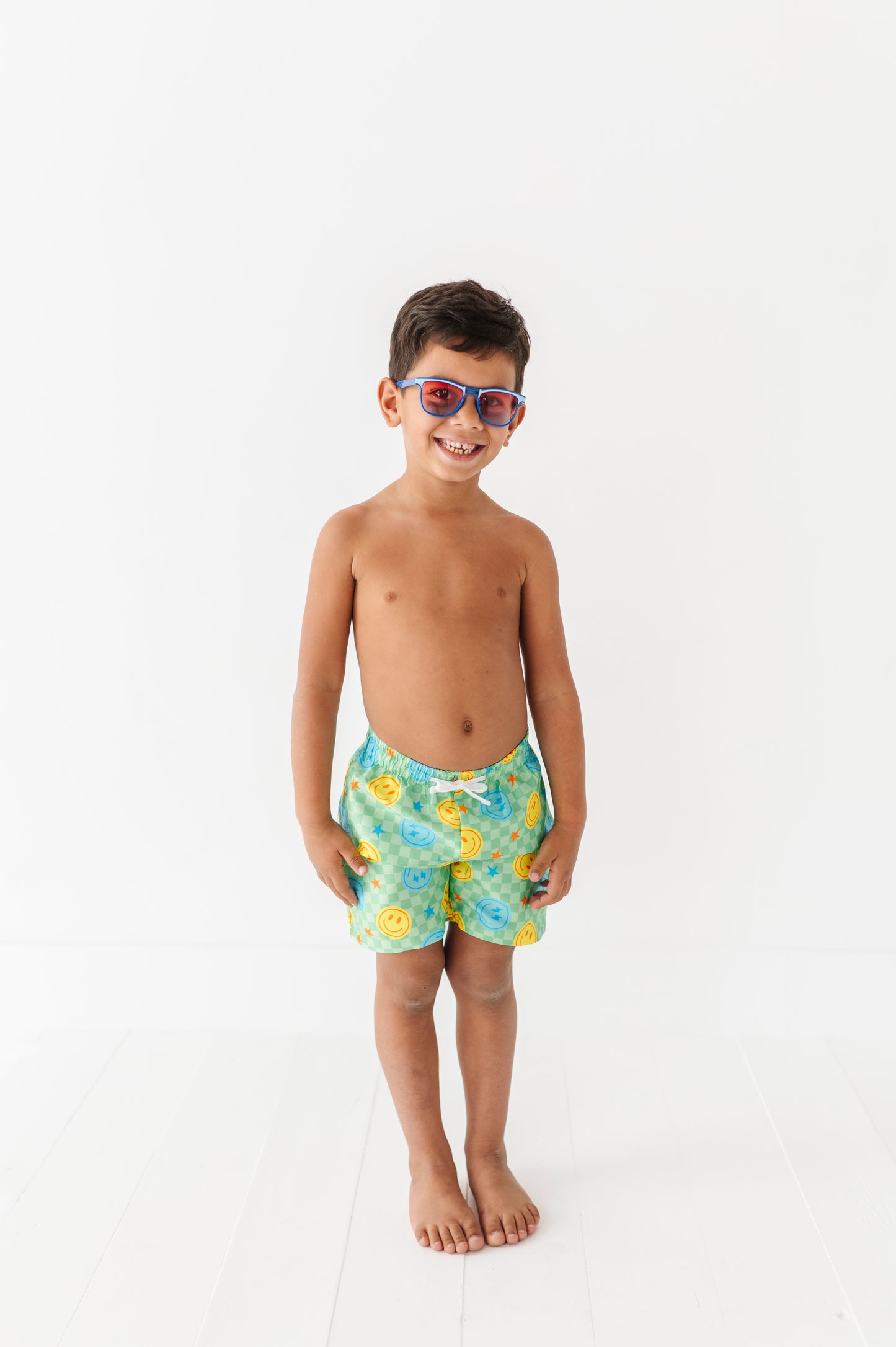 Electric Smiles Swim Trunks
