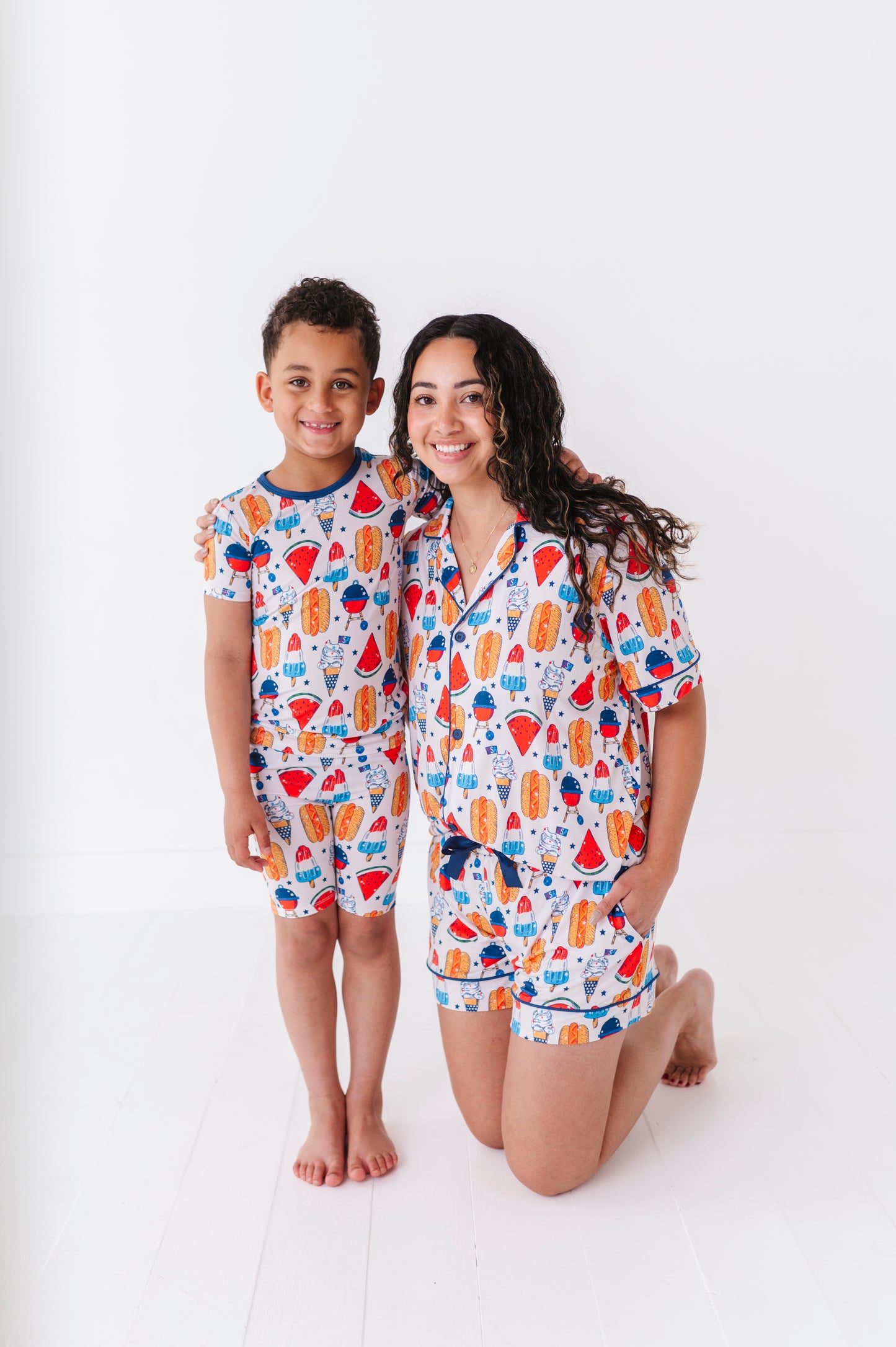 Mom wearing 4th of July hot dog pajamas made from soft bamboo fabric, perfect for matching family sets