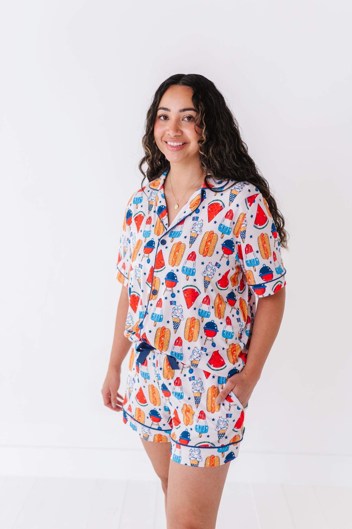 Mom wearing 4th of July hot dog pajamas made from soft bamboo fabric, perfect for matching family sets
