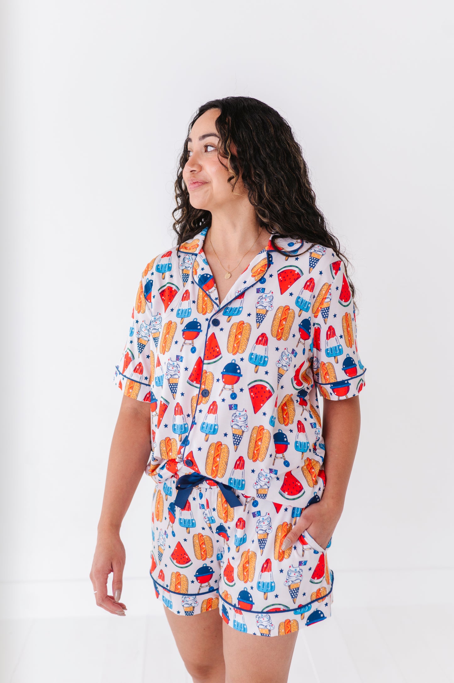 Mom wearing 4th of July hot dog pajamas made from soft bamboo fabric, perfect for matching family sets
