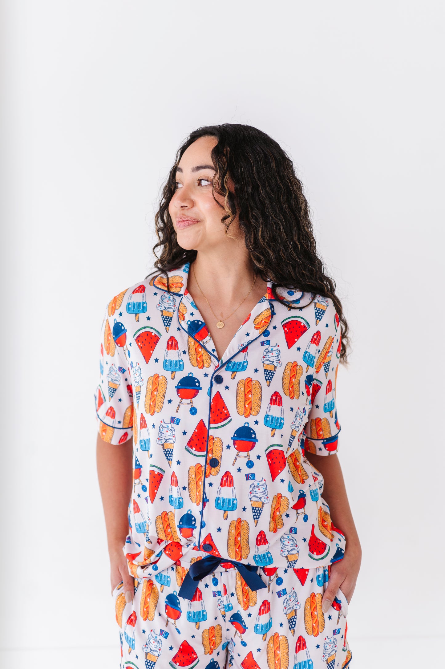Mom wearing 4th of July hot dog pajamas made from soft bamboo fabric, perfect for matching family sets