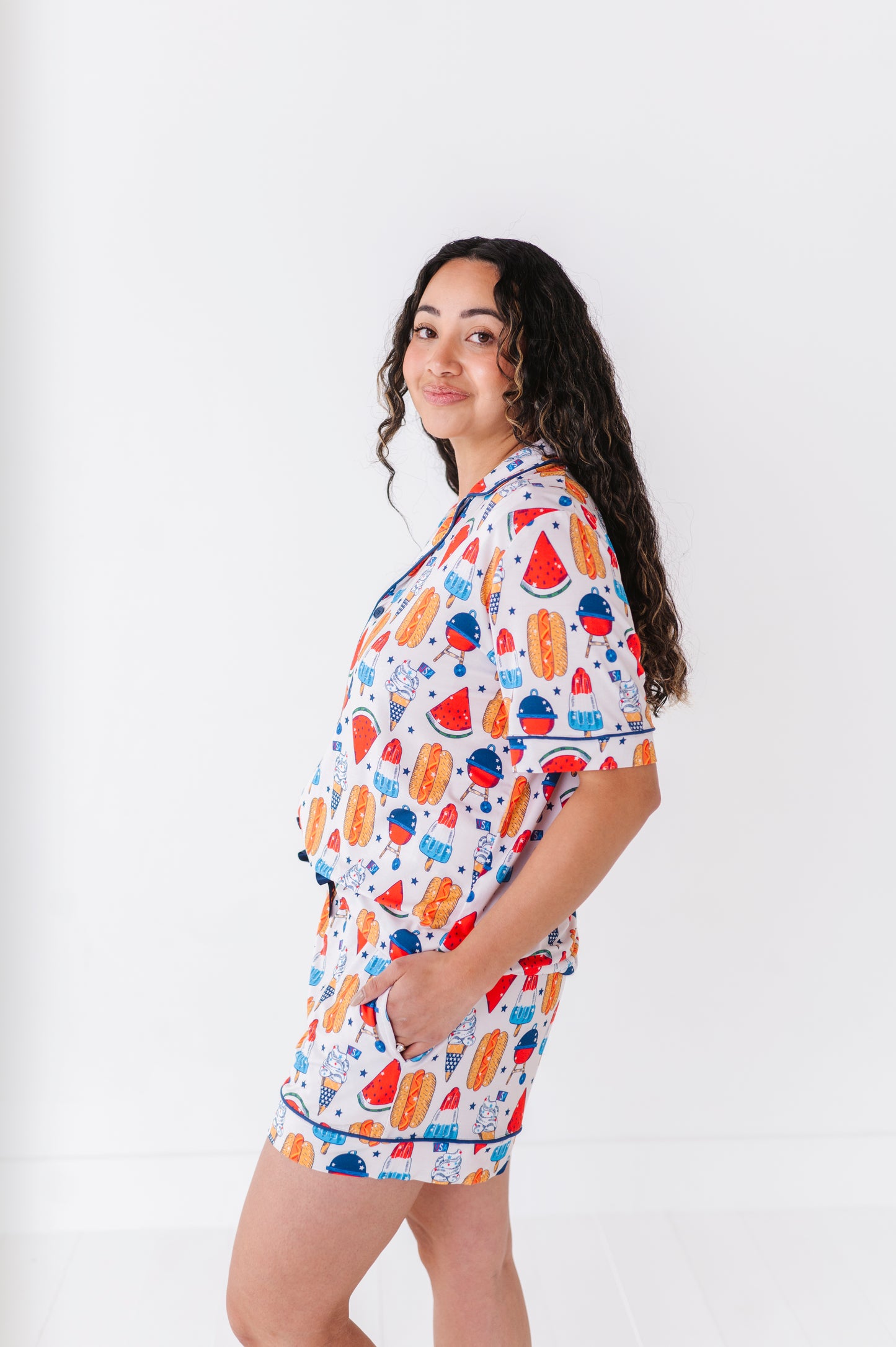 Mom wearing 4th of July hot dog pajamas made from soft bamboo fabric, perfect for matching family sets