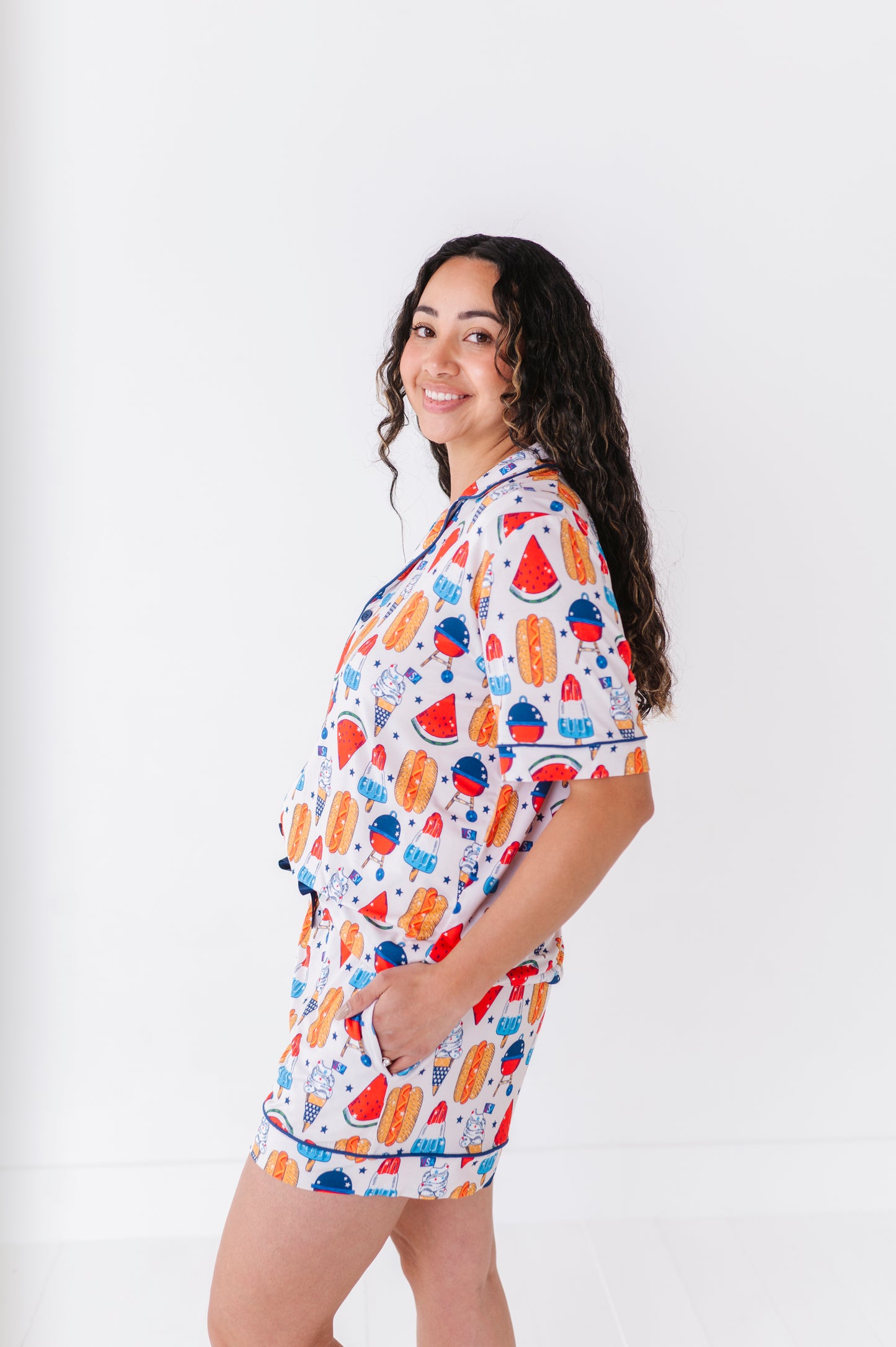Mom wearing 4th of July hot dog pajamas made from soft bamboo fabric, perfect for matching family sets