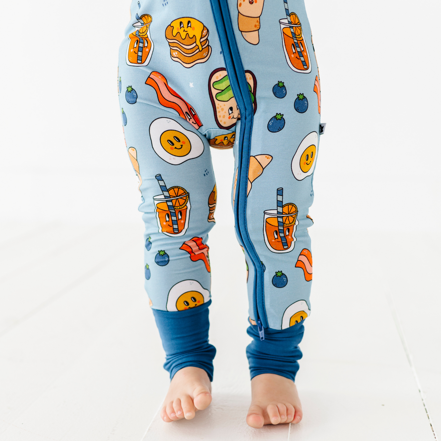 Baby in blue breakfast pajamas