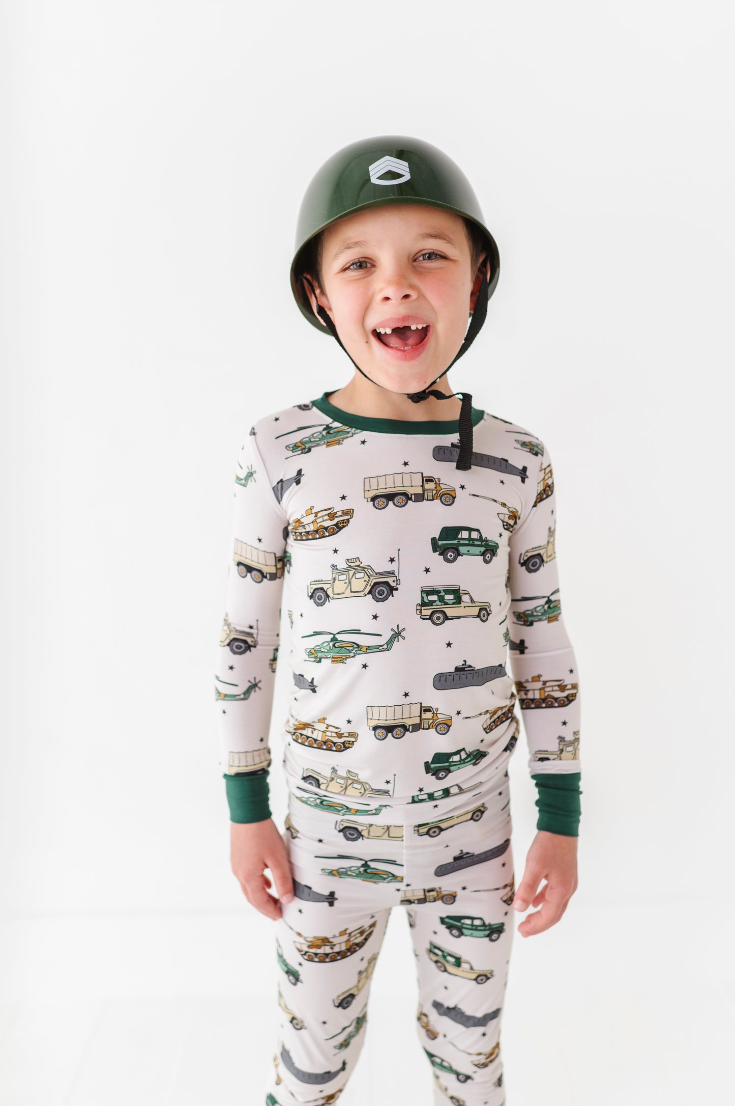 Boy rocking Military Vehicle Pajamas