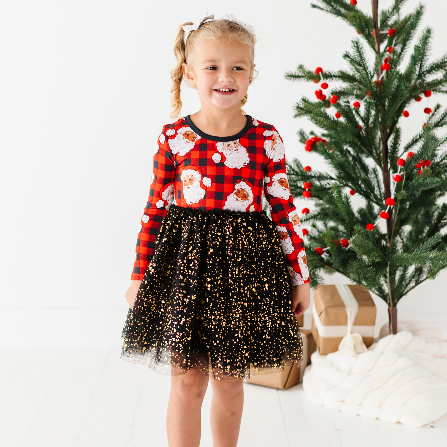Girl in Santa Christmas dress with foil tulle by Kiki and Lulu