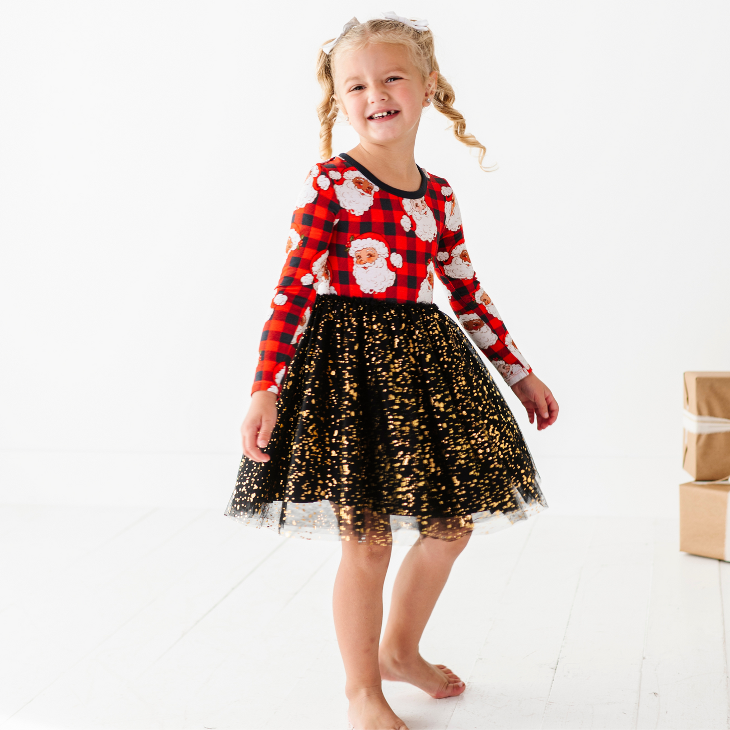 Girl in Santa Christmas dress with foil tulle by Kiki and Lulu