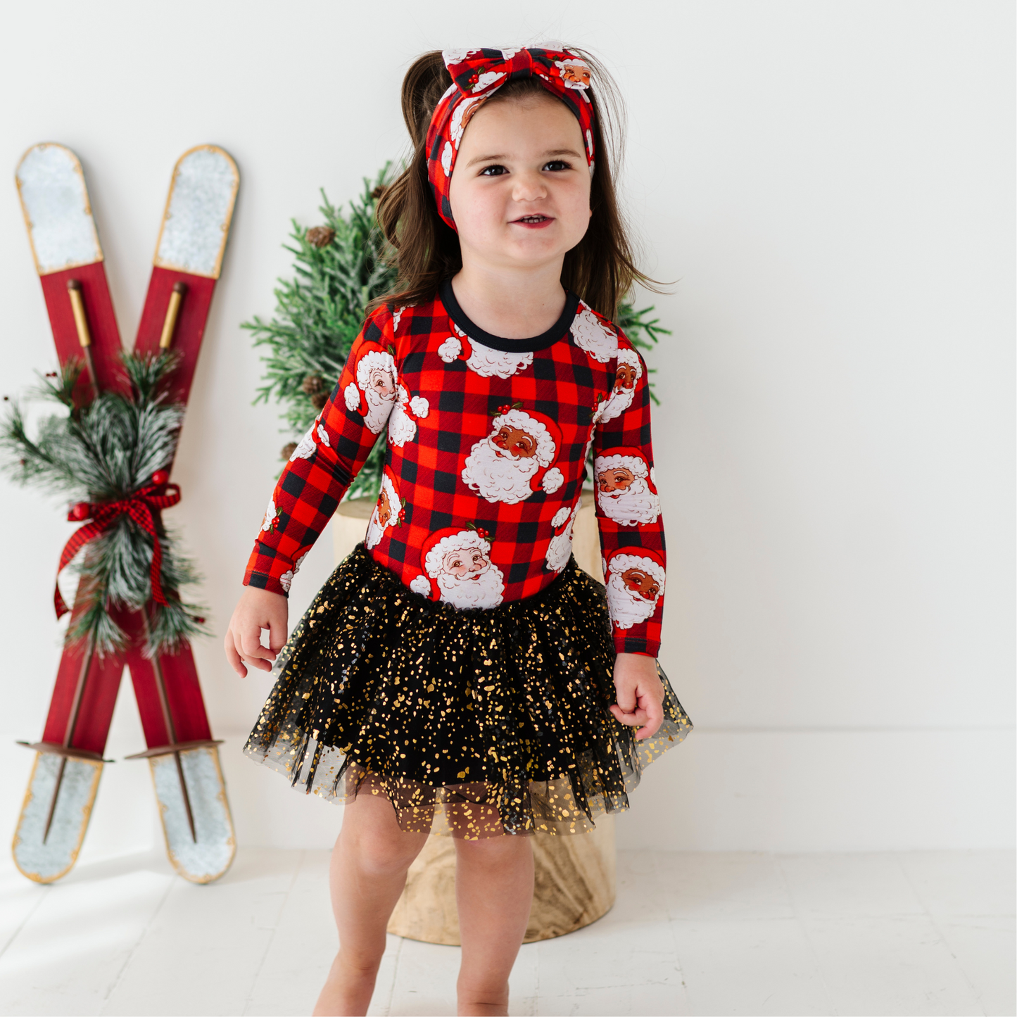 Girl in Christmas dress with tulle by Kiki and Lulu