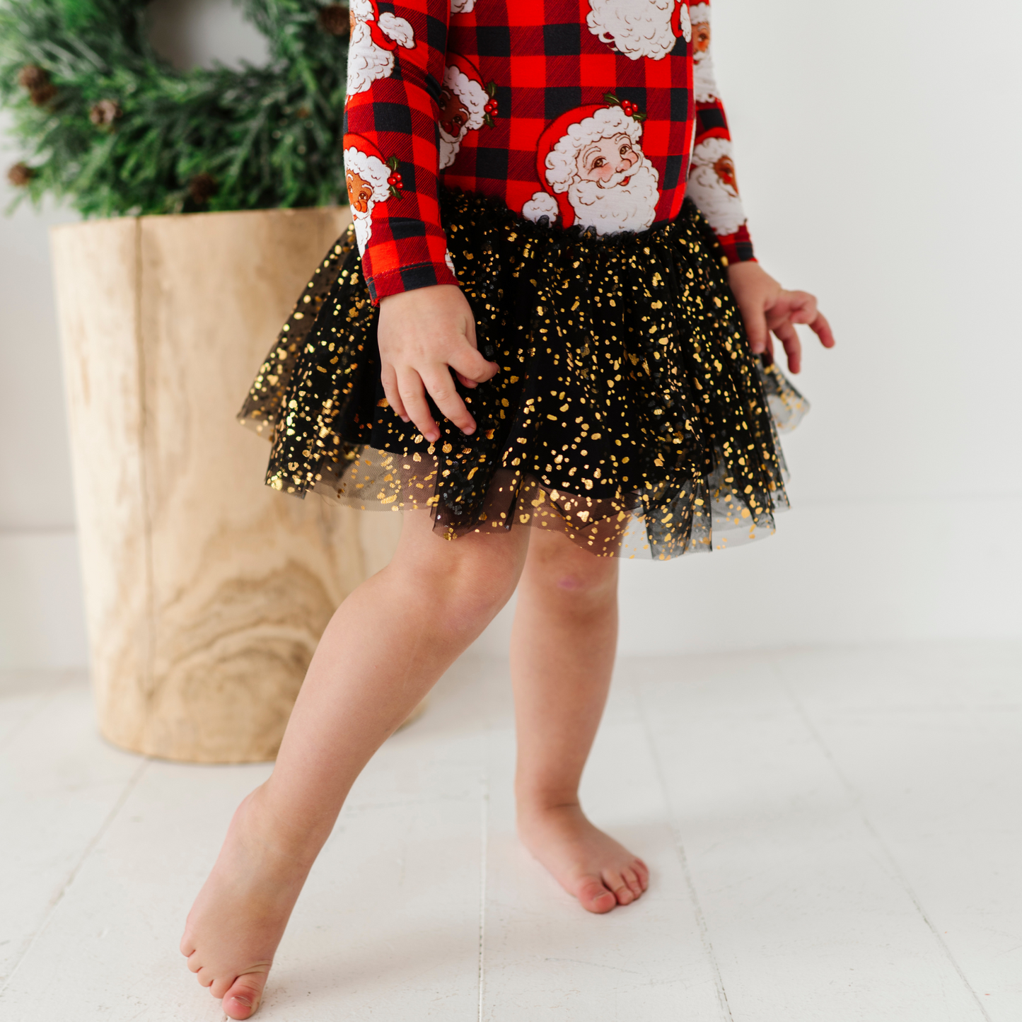 Girl in Christmas dress with tulle by Kiki and Lulu