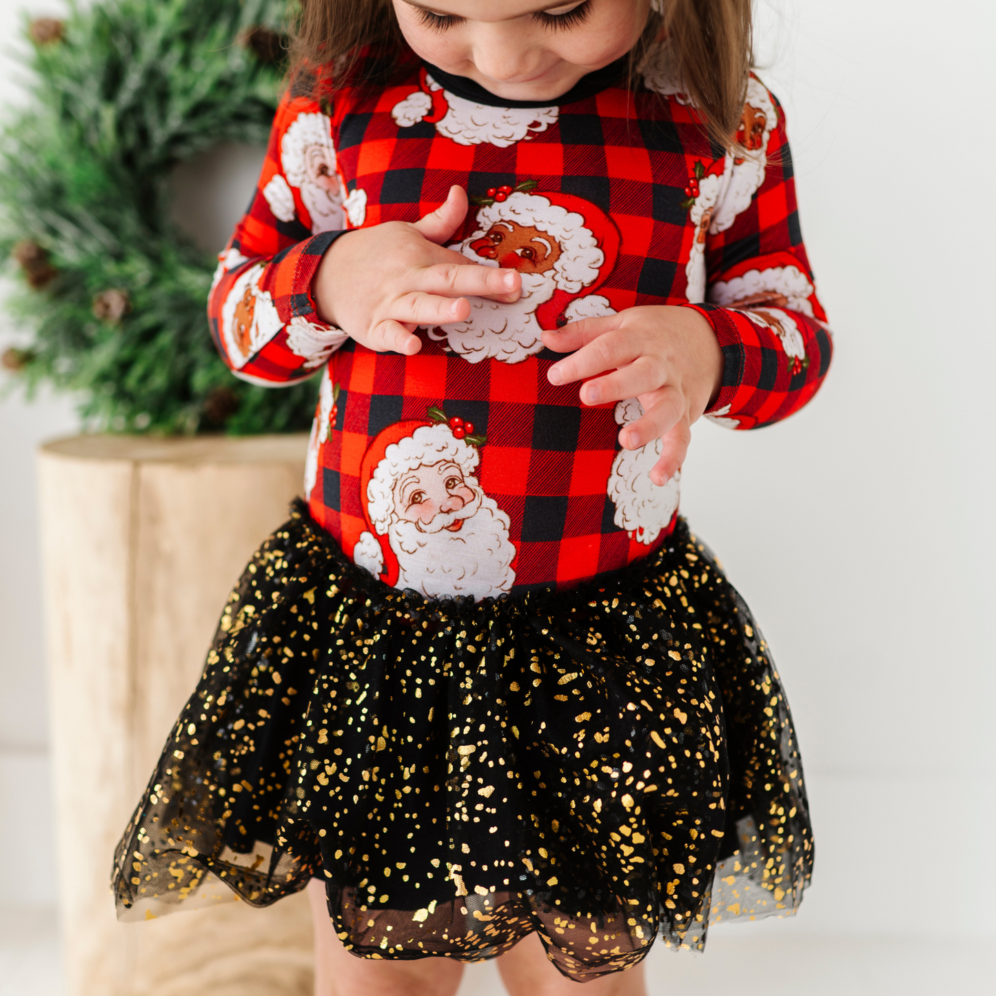 Girl in Christmas dress with tulle by Kiki and Lulu