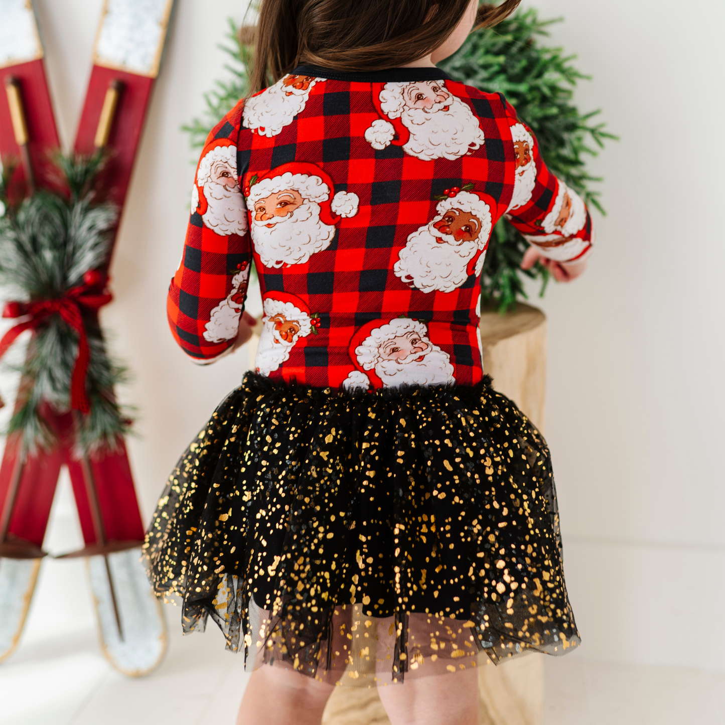 Girl in Christmas dress with tulle by Kiki and Lulu
