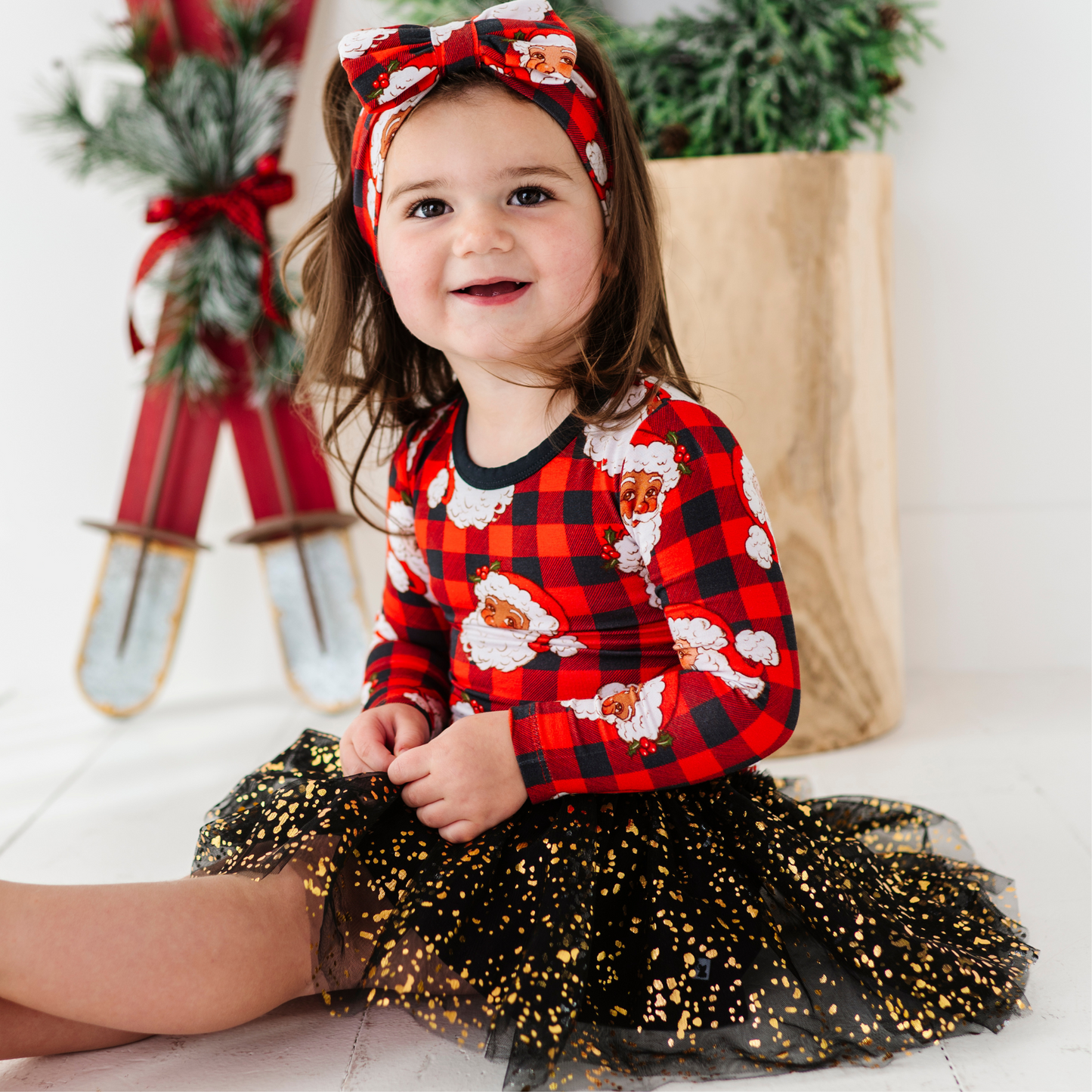 Girl in Christmas dress with tulle by Kiki and Lulu