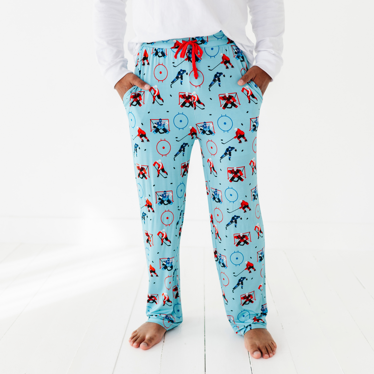 Man in hockey pajama pants