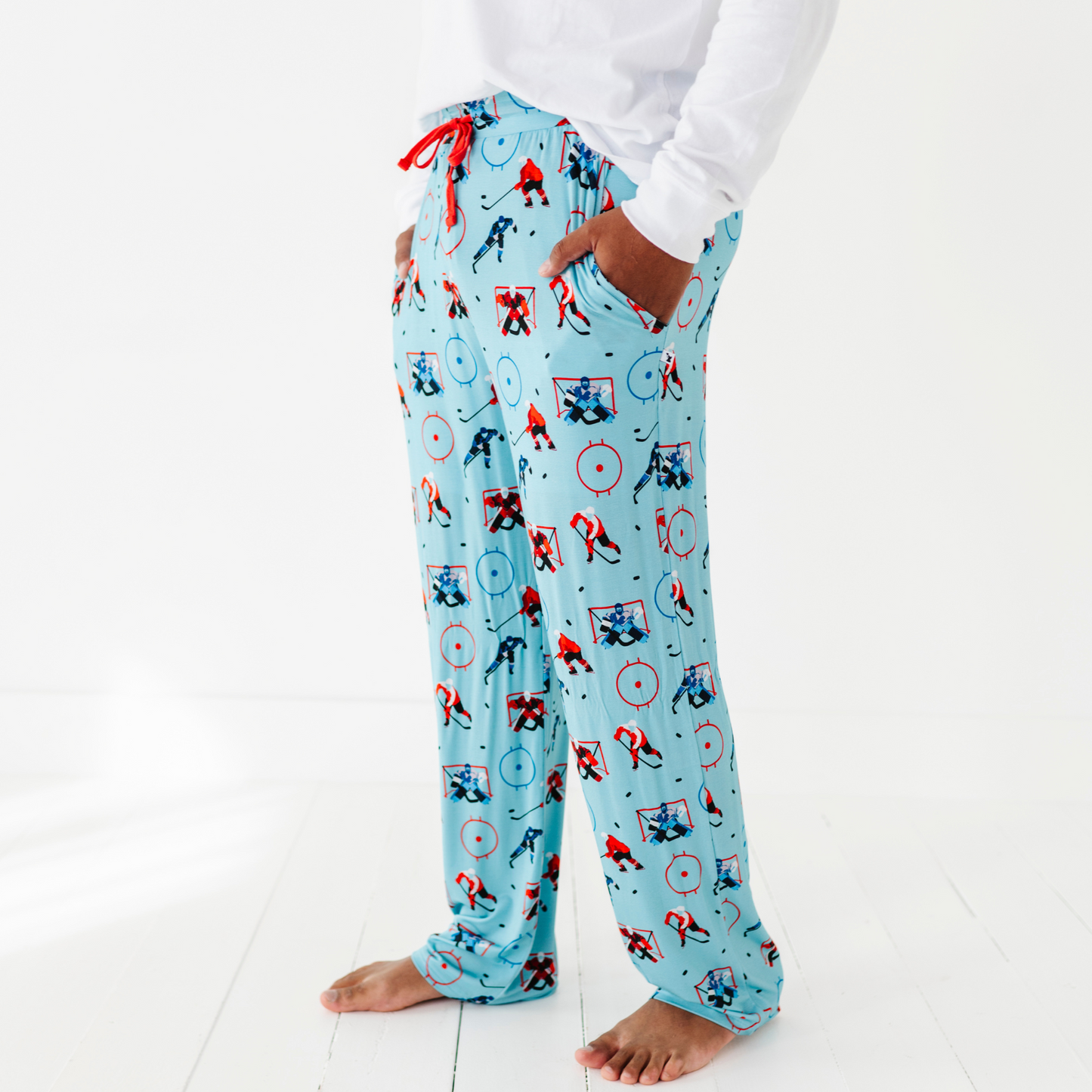 Man in hockey pajama pants