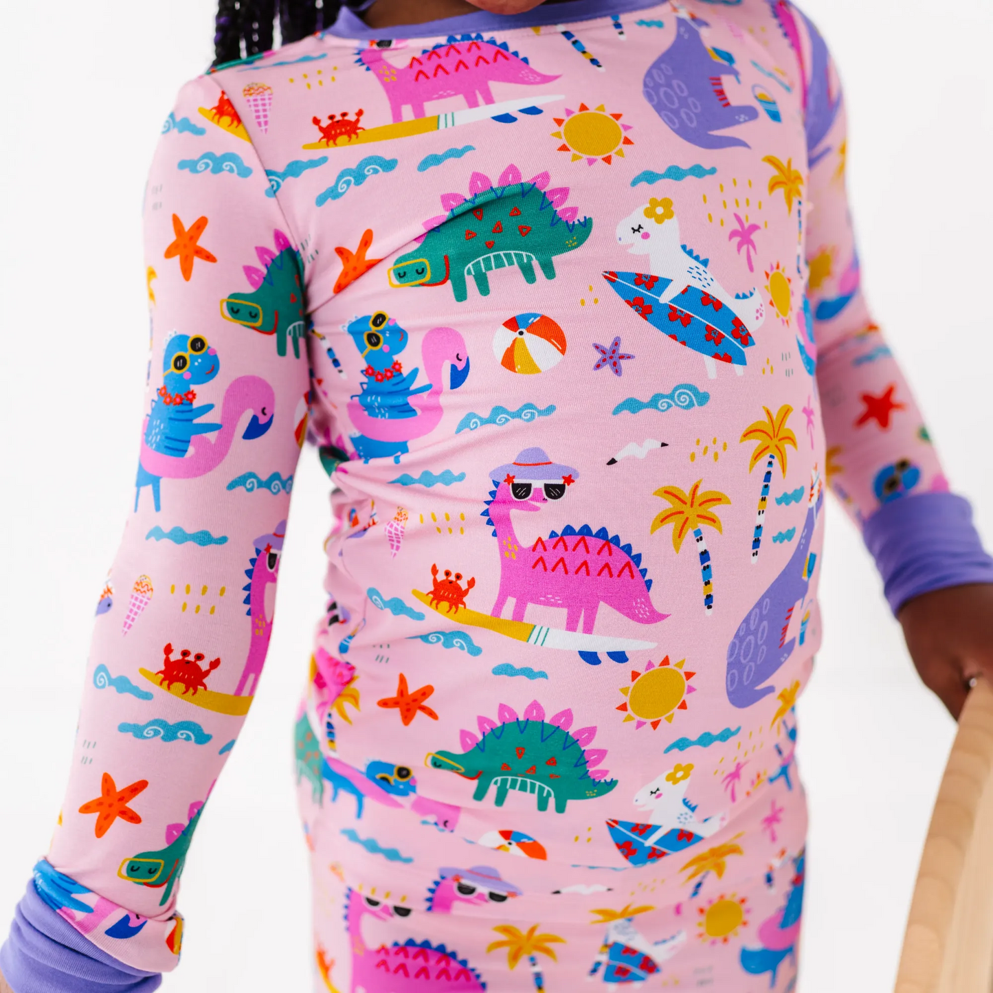 Pink dinosaur pajamas by Kiki and Lulu
