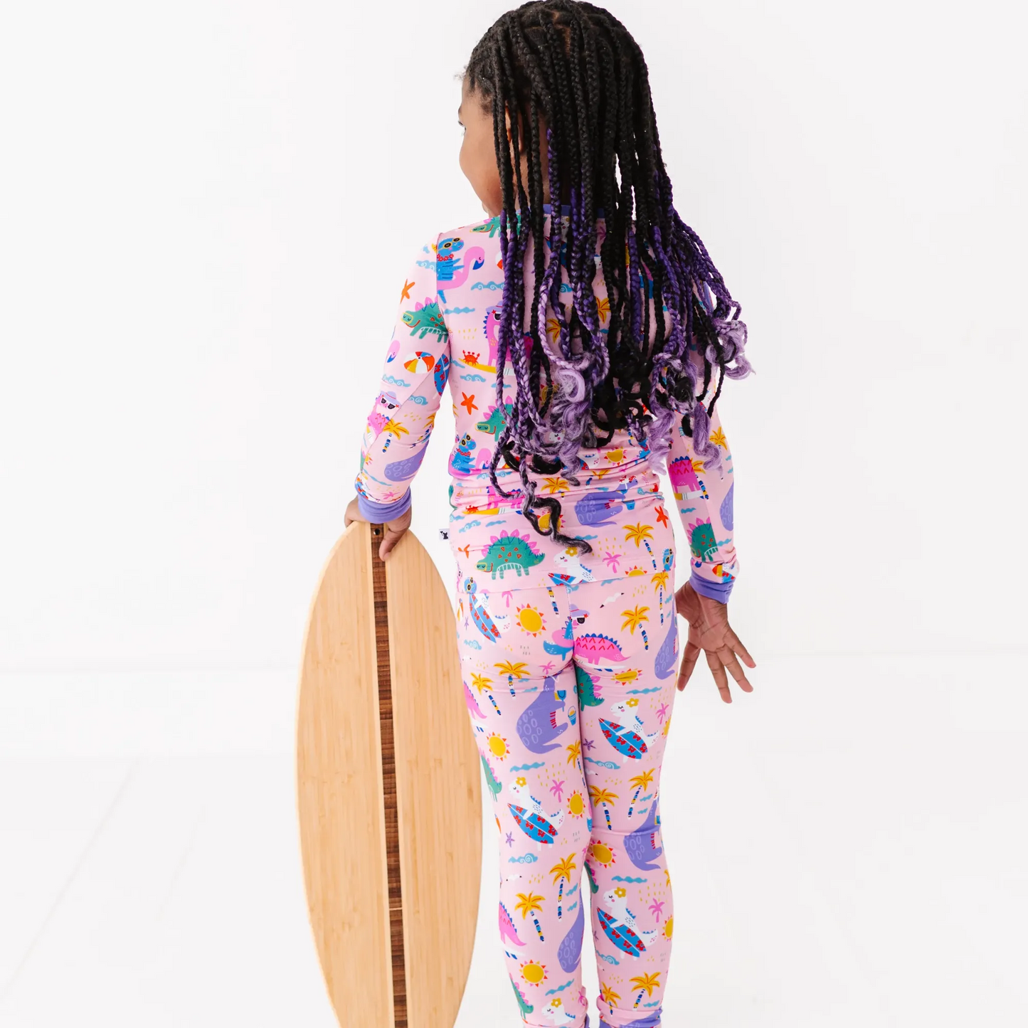 Pink dinosaur pajamas by Kiki and Lulu