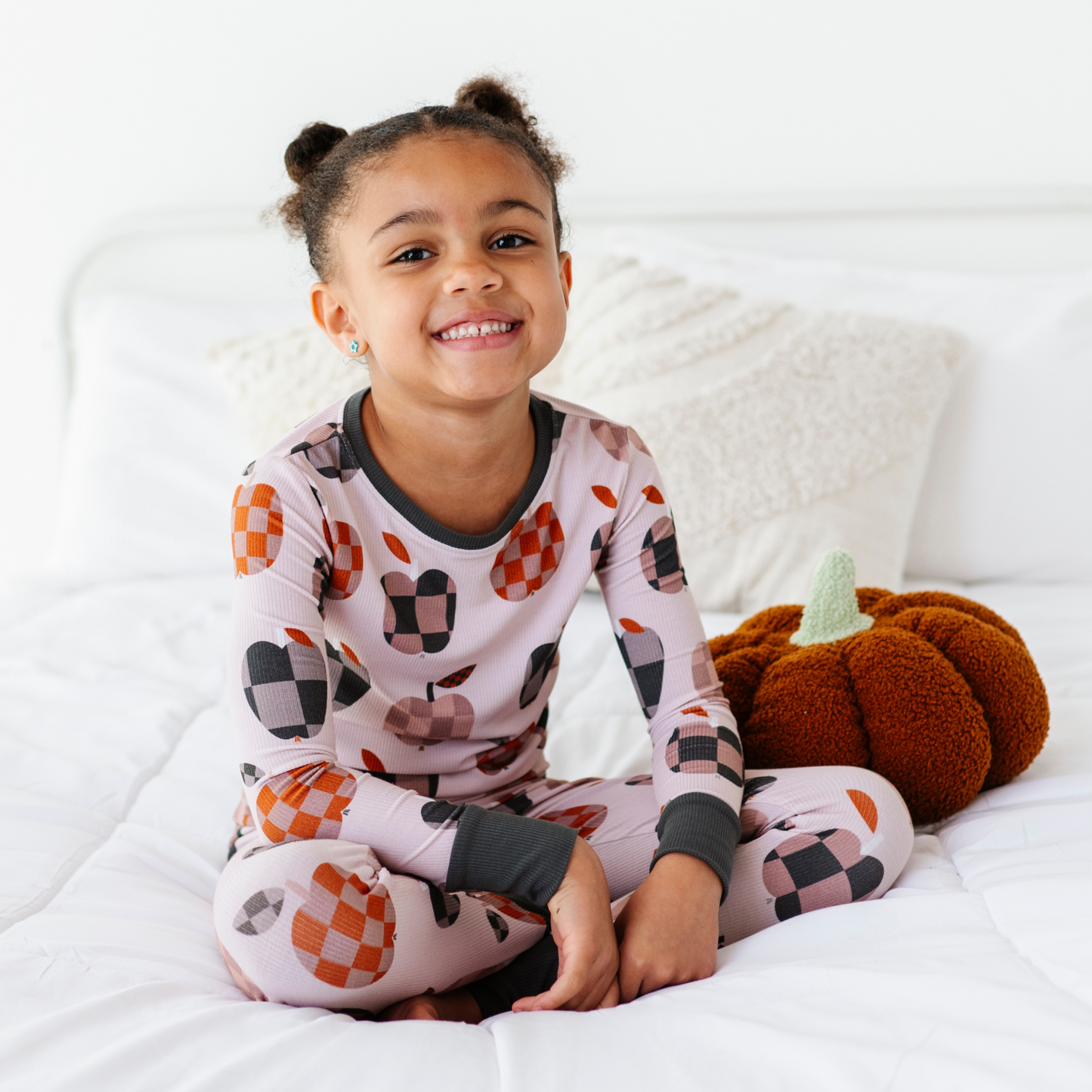 Girl Wearing Fall Apple Kids Pajamas