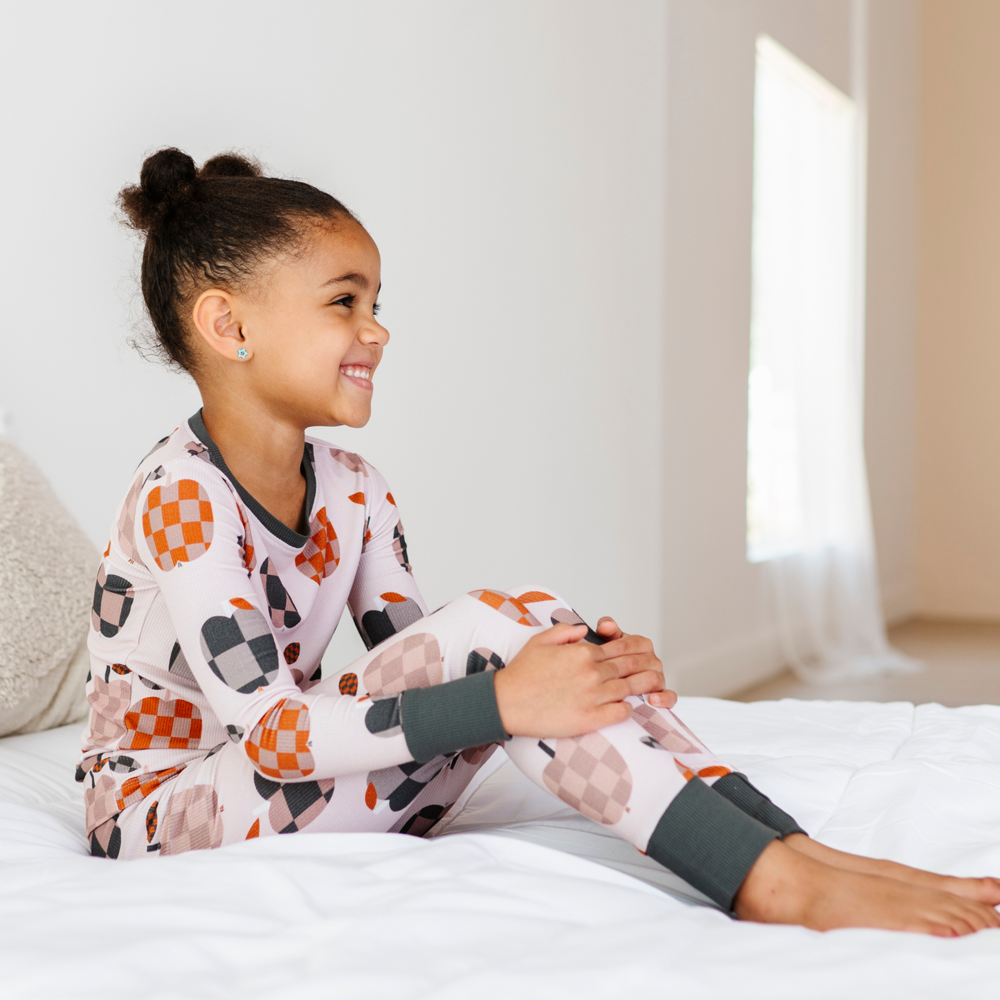 Girl Wearing Fall Apple Kids Pajamas