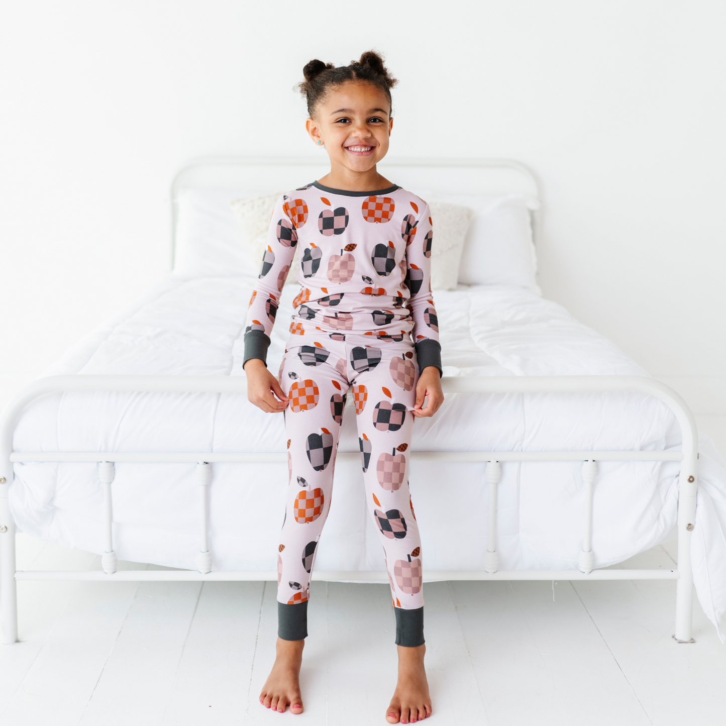 Girl Wearing Fall Apple Kids Pajamas