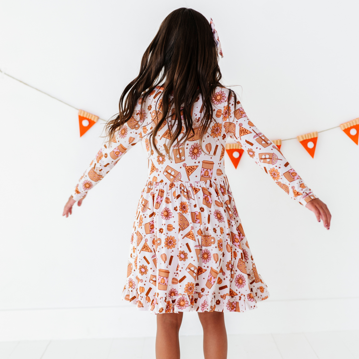 Girl in Pumpkin Spice Latte Dress by Kiki and Lulu
