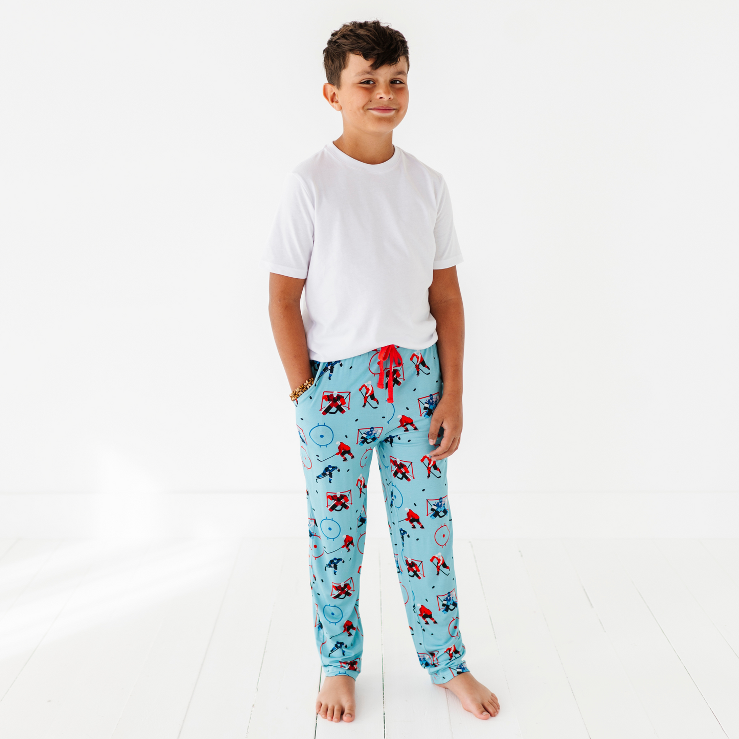 Boy in Hockey Pajama pants