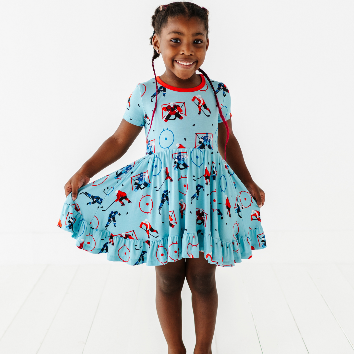 Girl wearing hockey dress by Kiki and Lulu