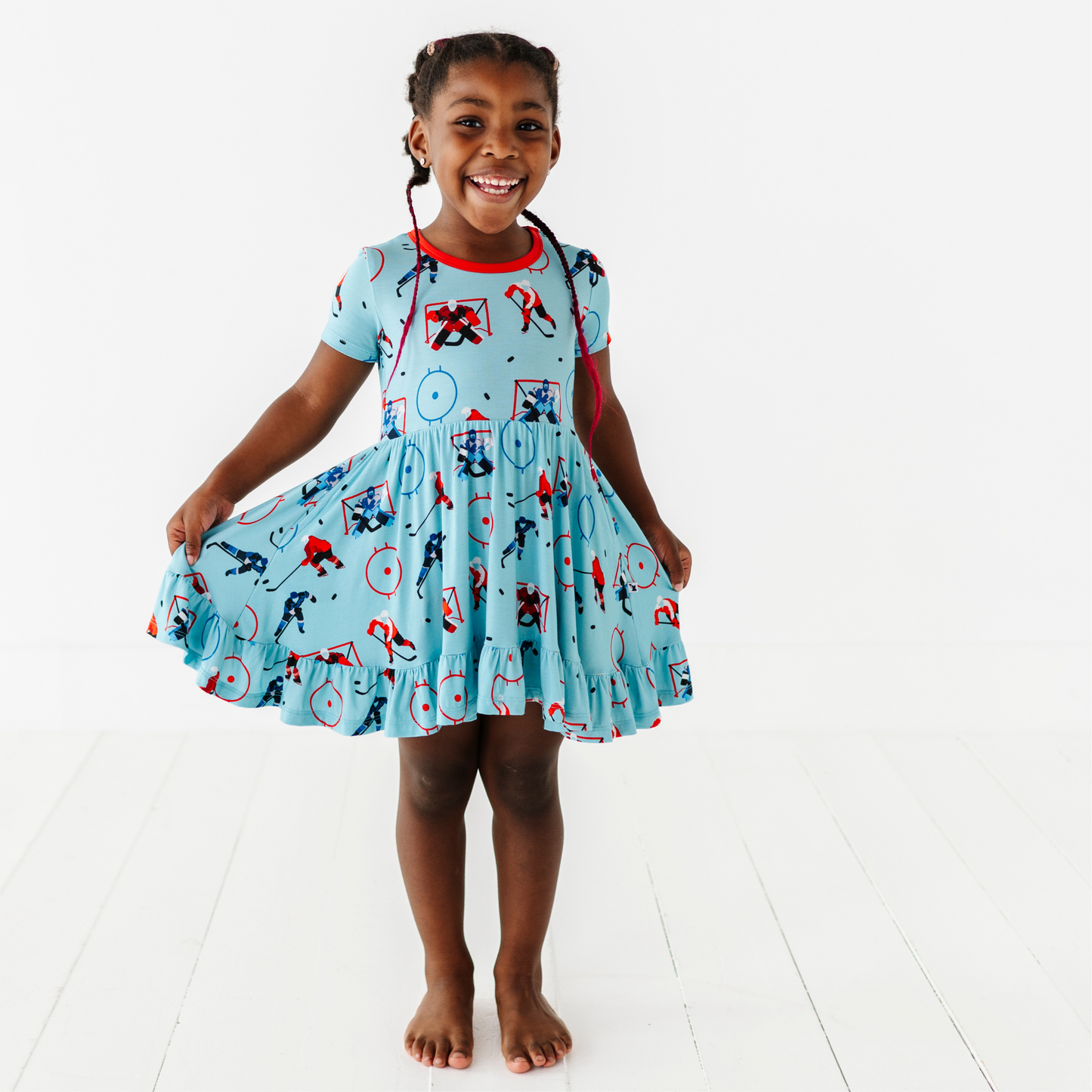 Girl wearing hockey dress by Kiki and Lulu