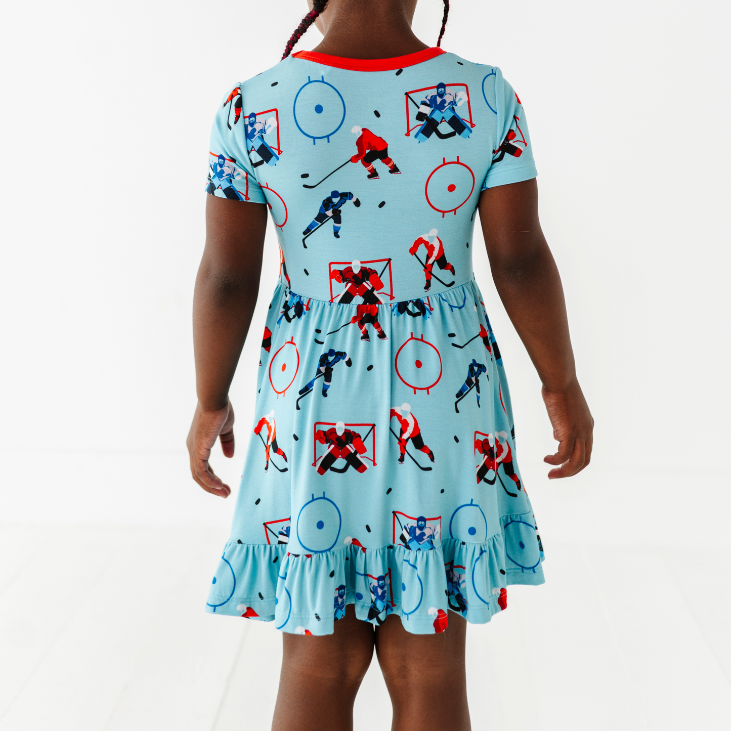 Girl wearing hockey dress by Kiki and Lulu
