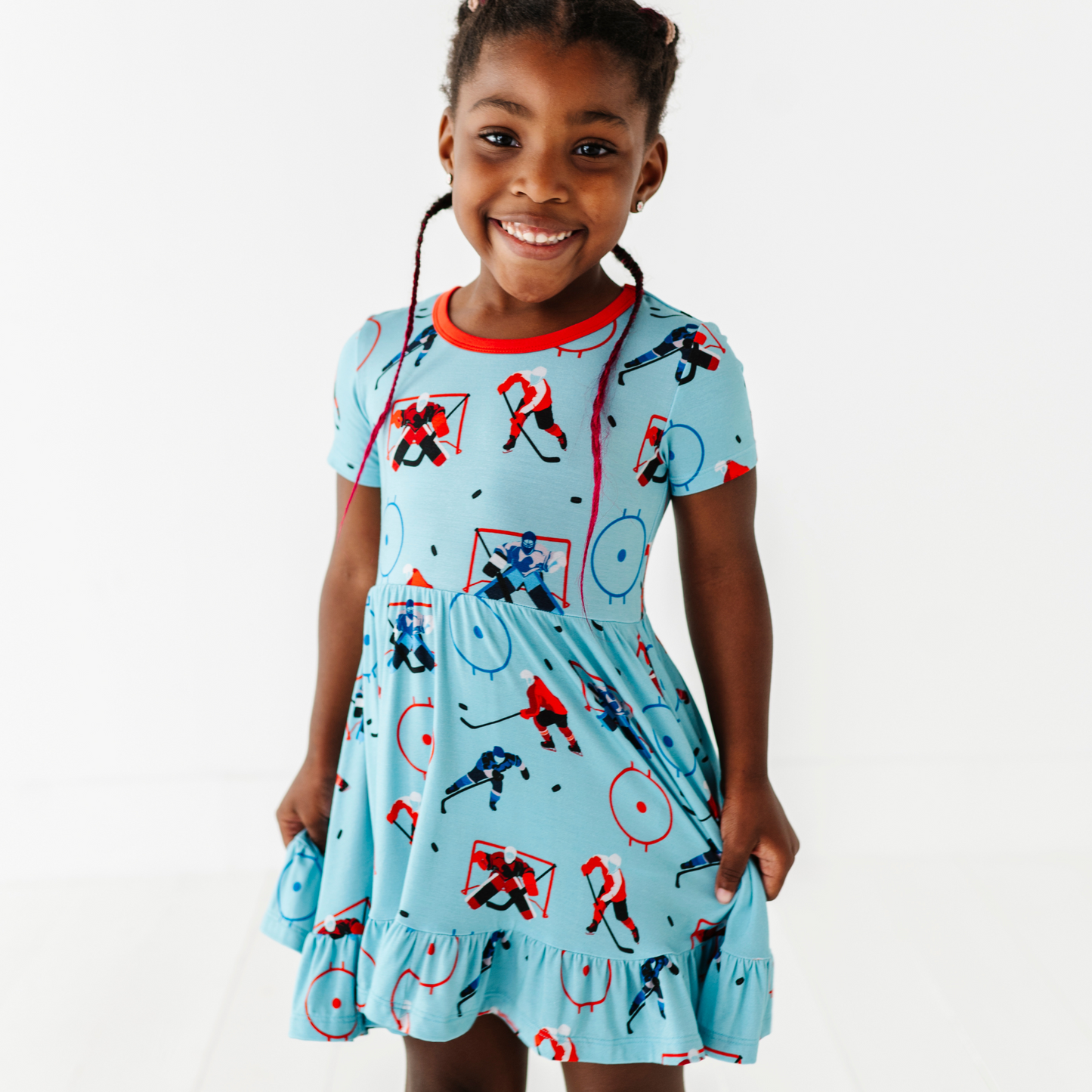 Girl wearing hockey dress by Kiki and Lulu