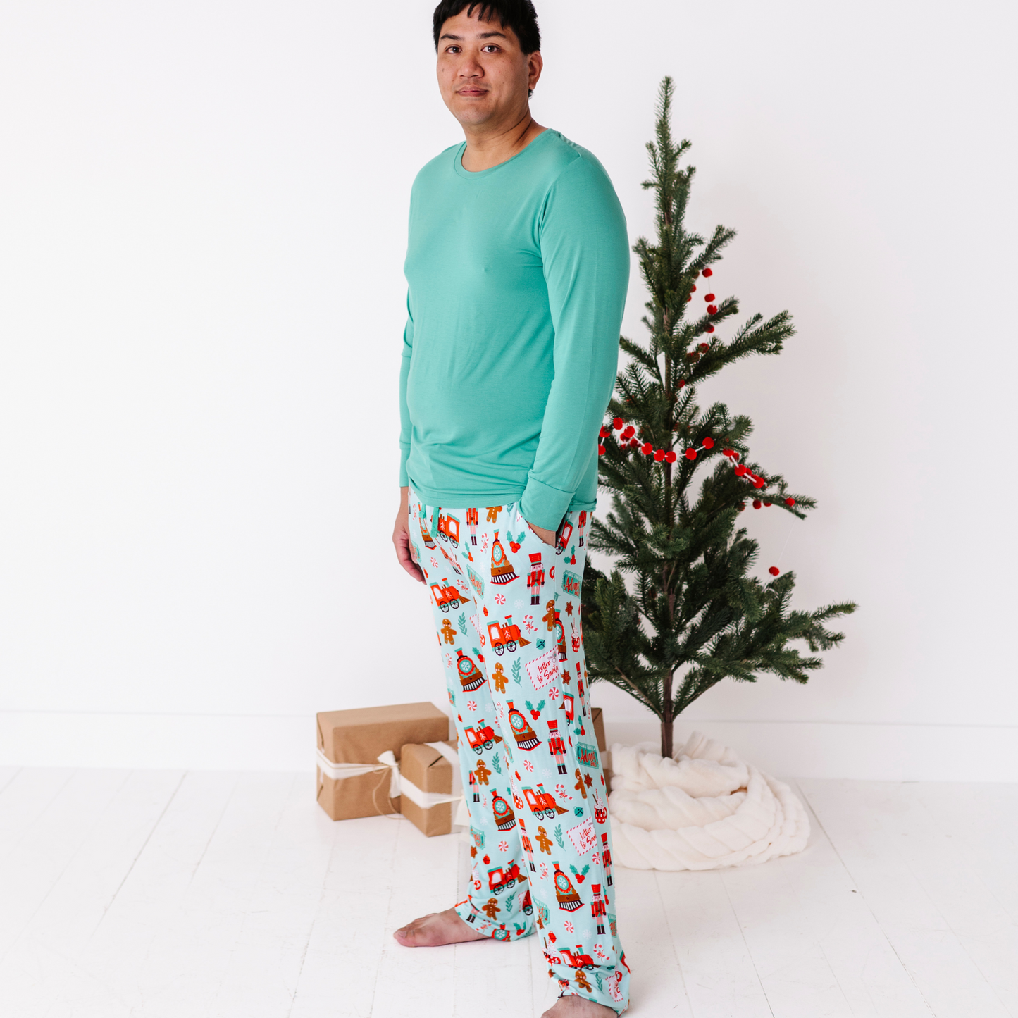 Man in Polar Express pajamas