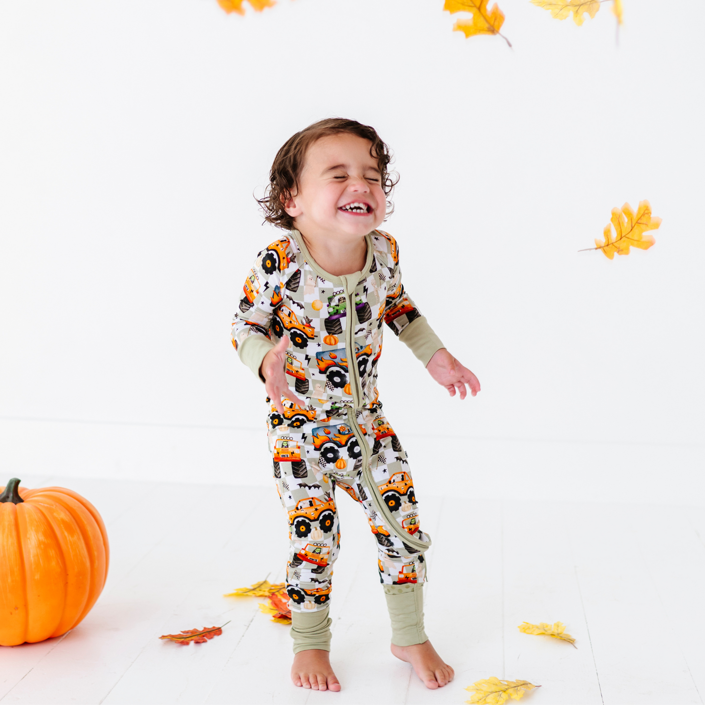 Boy in Halloween Monster Truck Pajamas by Kiki and Lulu
