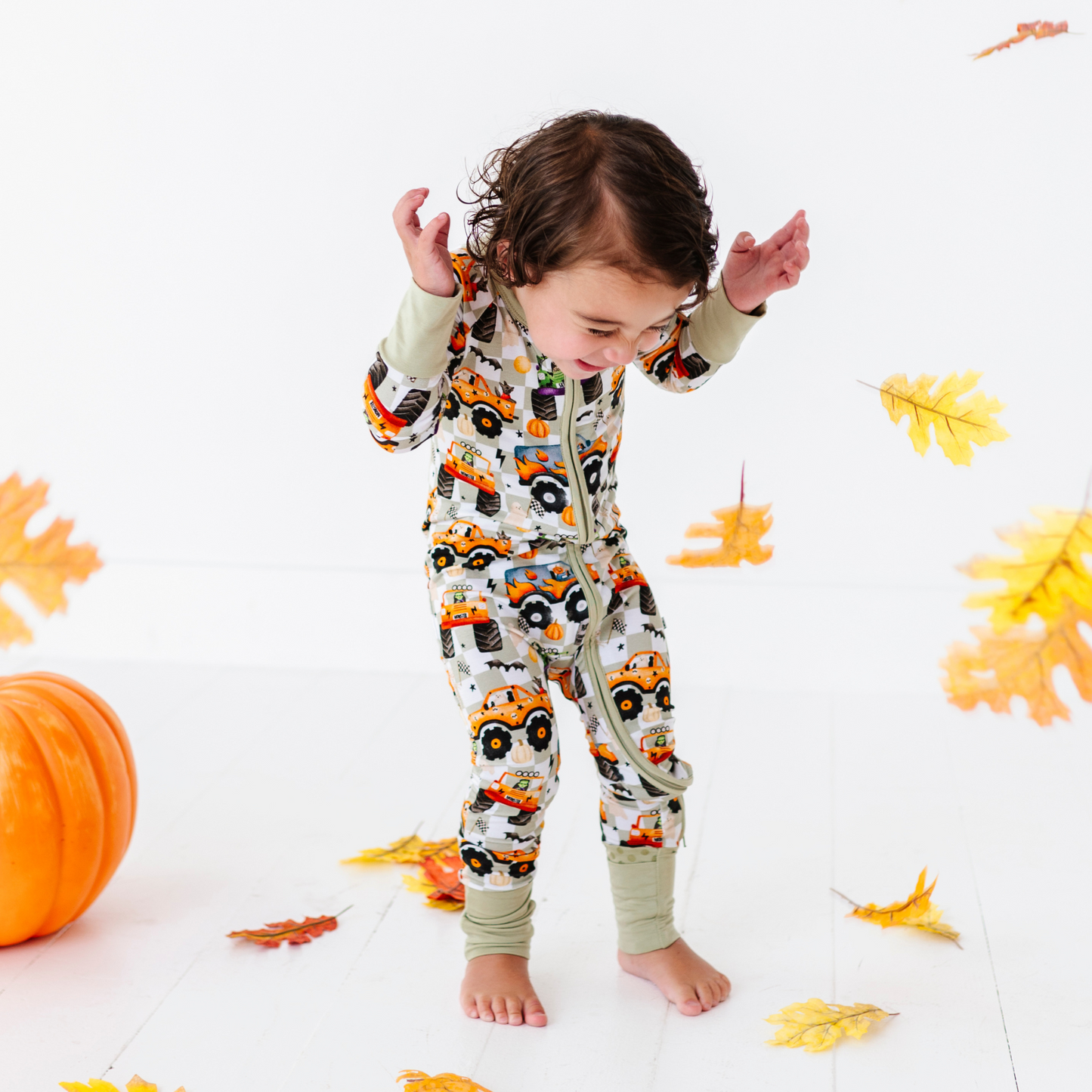 Boy in Halloween Monster Truck Pajamas by Kiki and Lulu