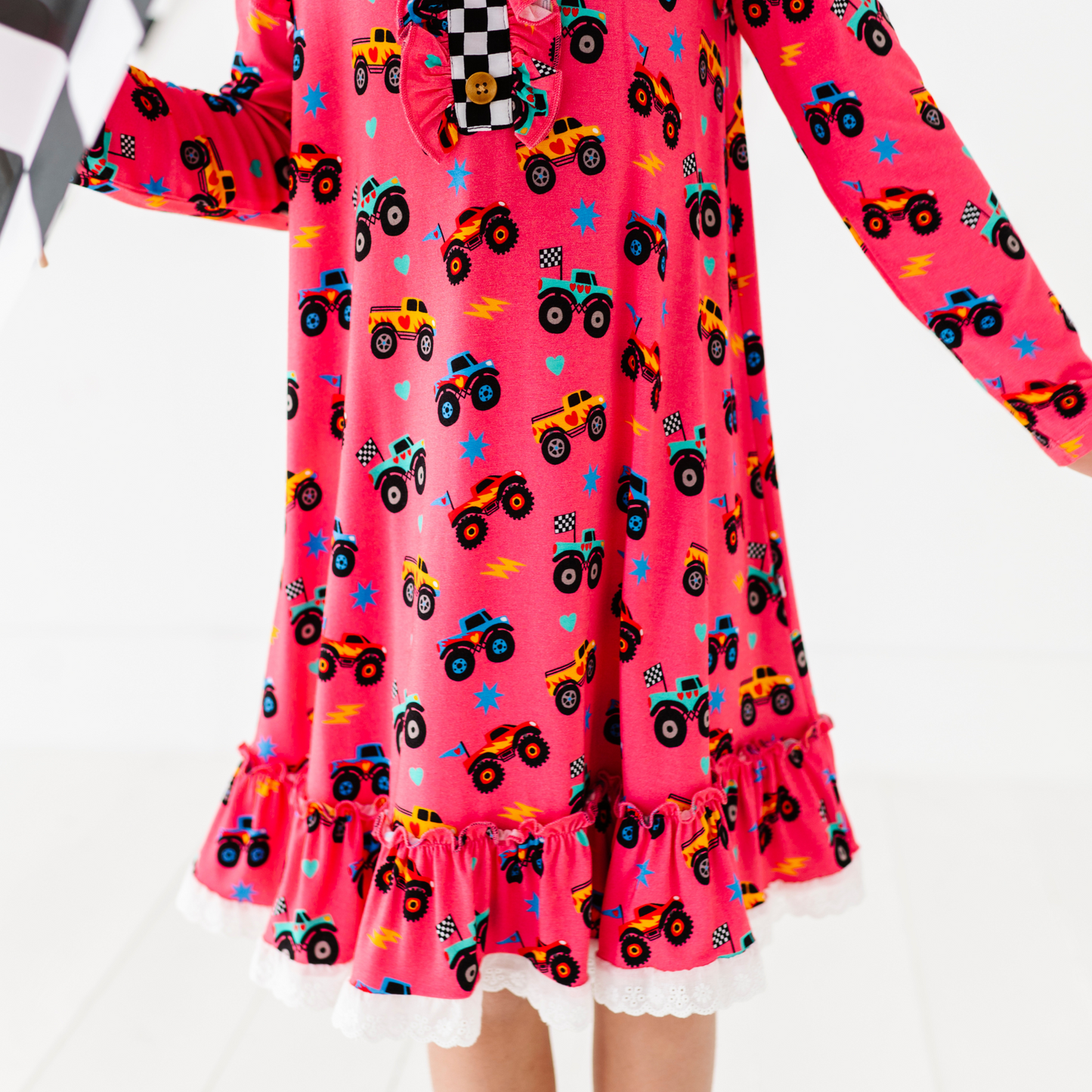 Girl in Monster Truck nightgown by Kiki and Lulu