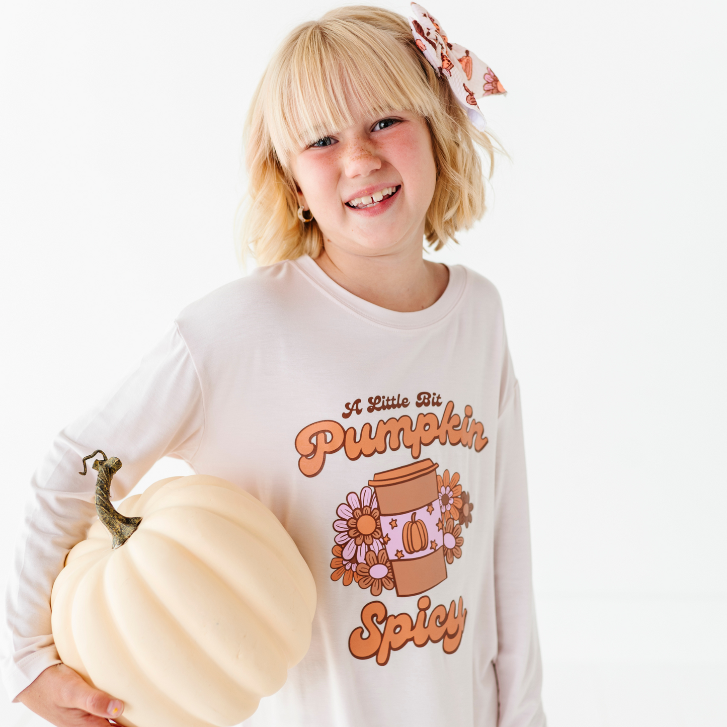 Girl in pumpkin spice latte set
