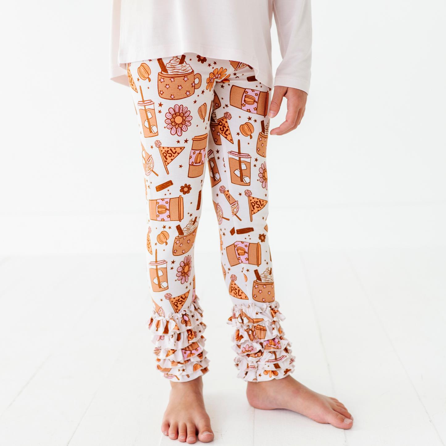 Girl in pumpkin spice latte set