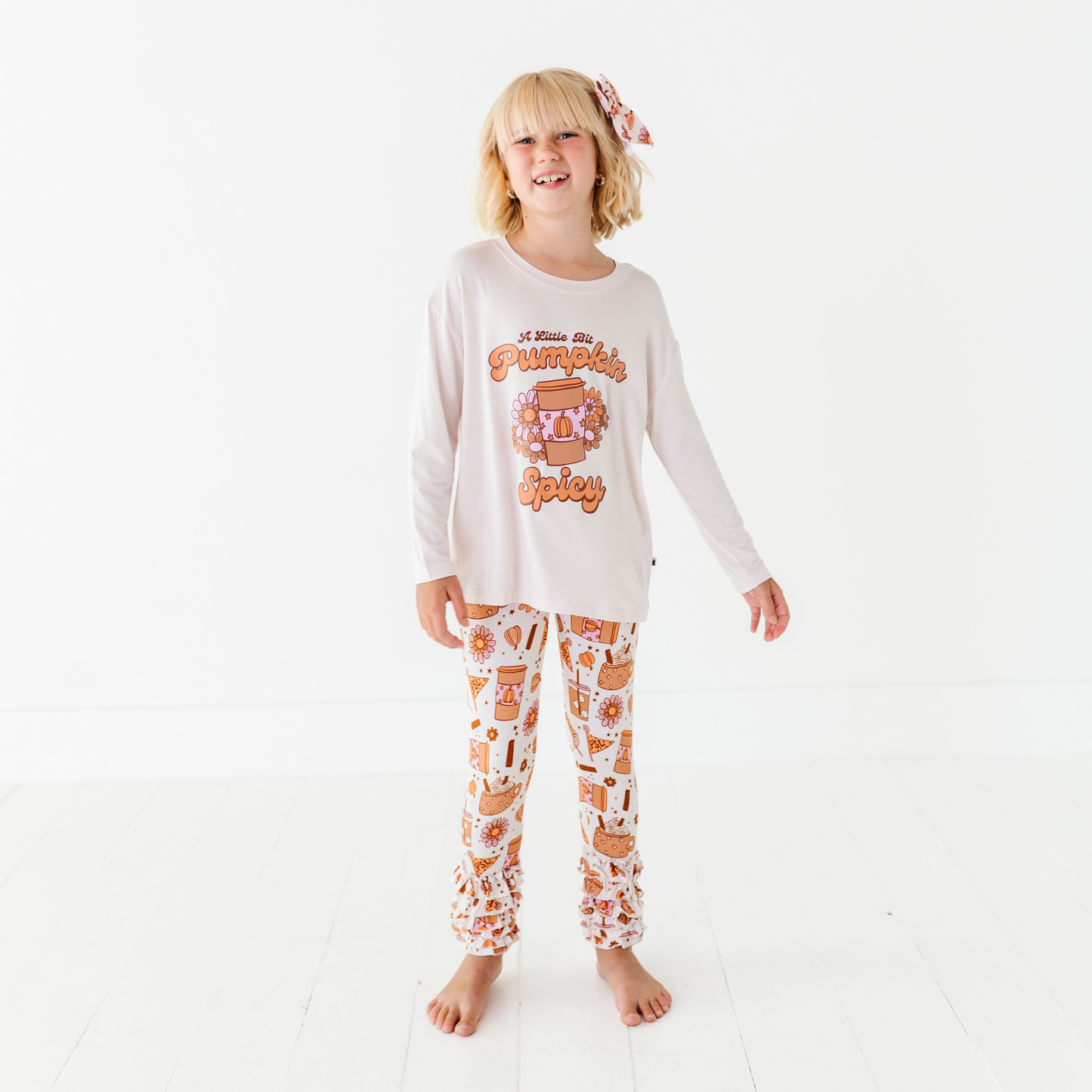 Girl in pumpkin spice latte set