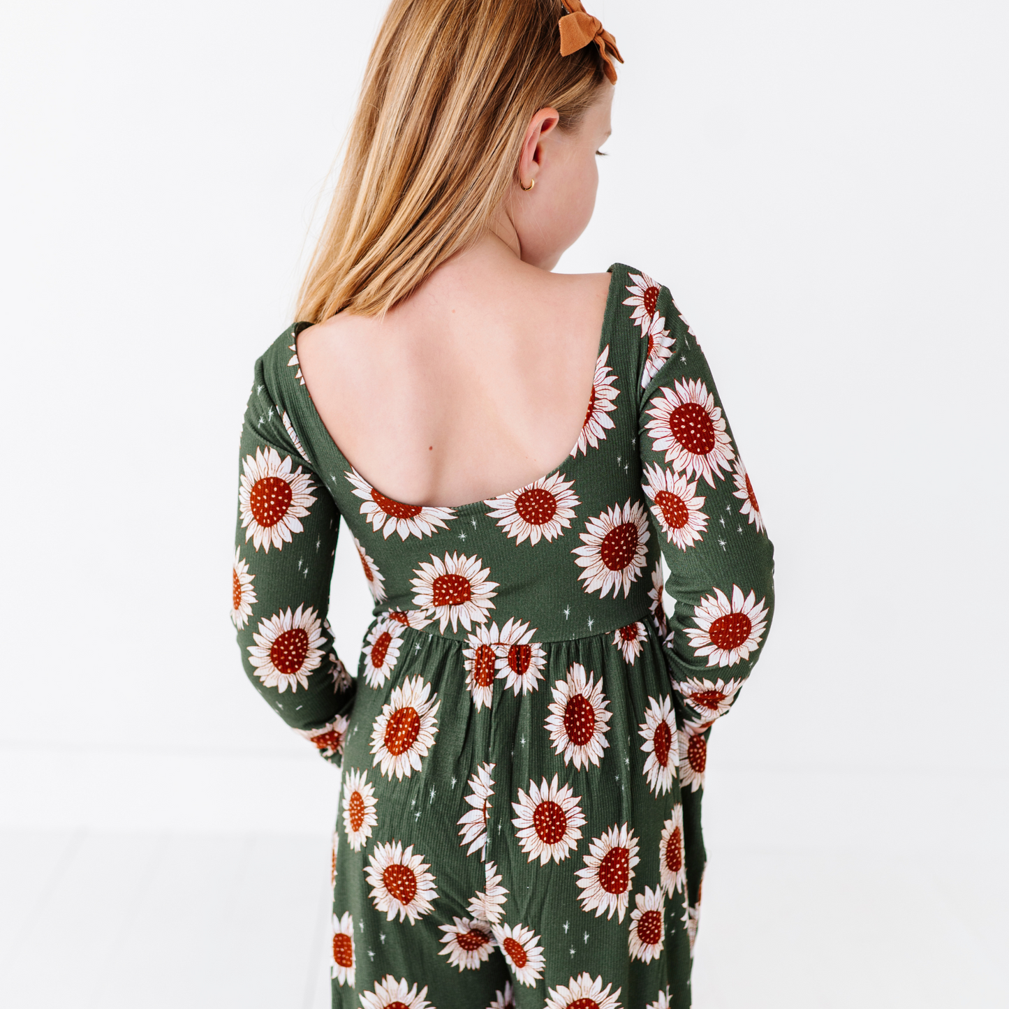 Sunflower wide-leg romper by Kiki and Lulu.