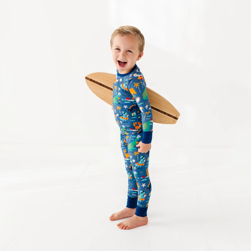 
                      
                        Blue dinosaur bamboo pajamas by Kiki and Lulu
                      
                    