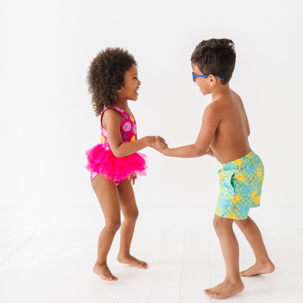
                      
                        Electric Smiles Swimsuit With Tutu
                      
                    