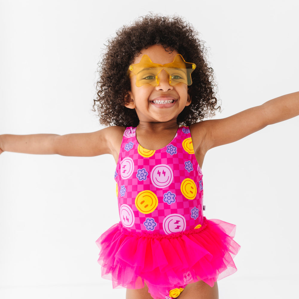 
                      
                        Electric Smiles Swimsuit With Tutu
                      
                    