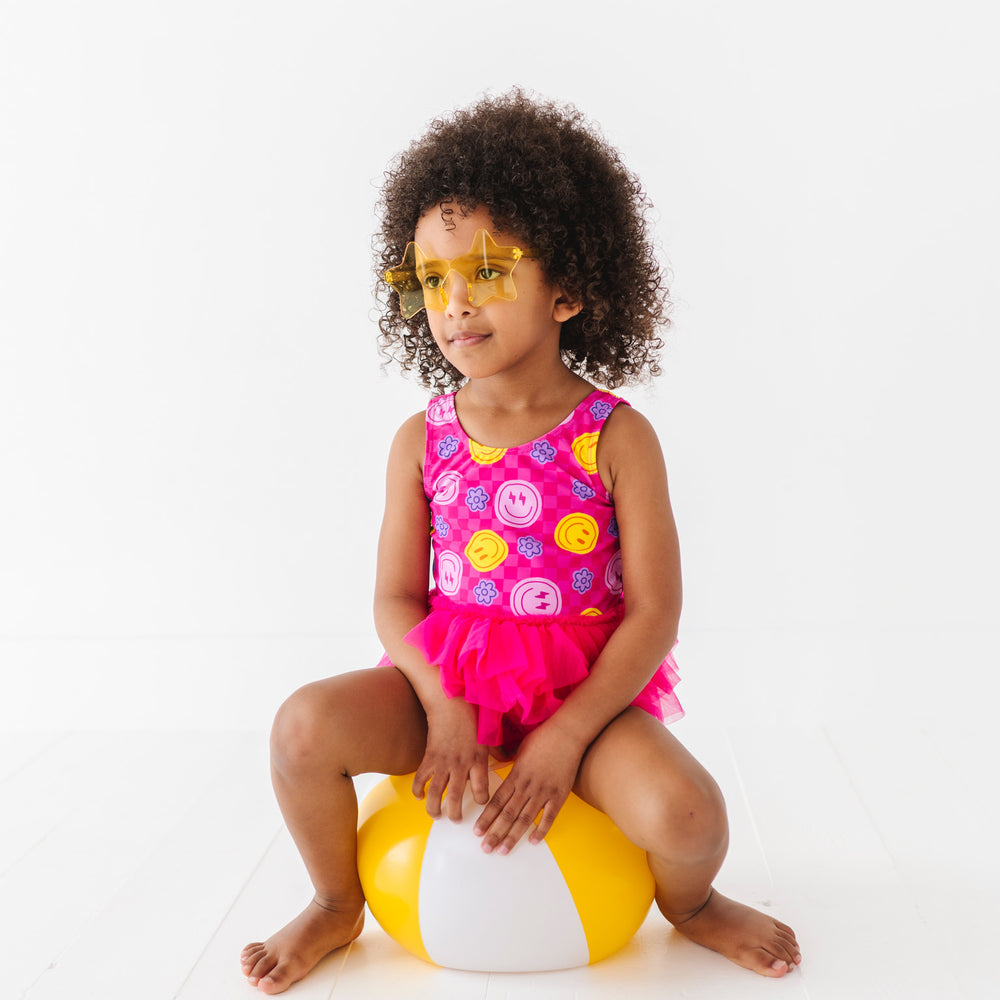 
                      
                        Electric Smiles Swimsuit With Tutu
                      
                    