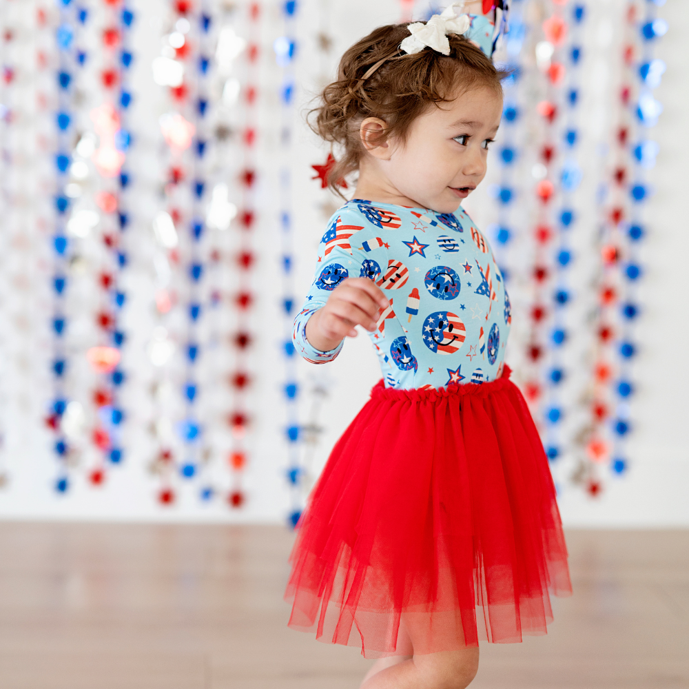 toddler in 4th of july dress by kiki and lulu