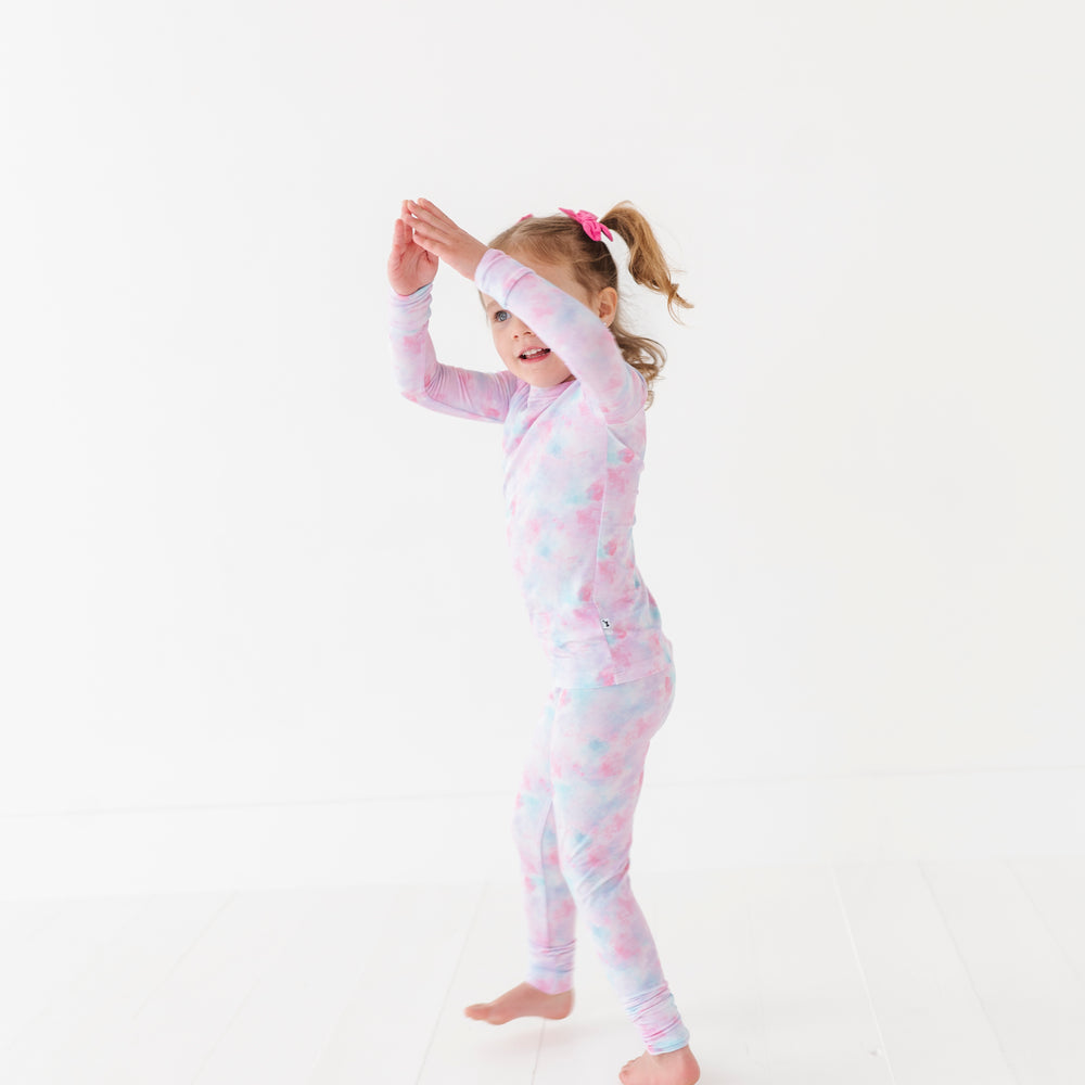
                      
                        Girl in Tie Dye Pajamas by Kiki and Lulu
                      
                    