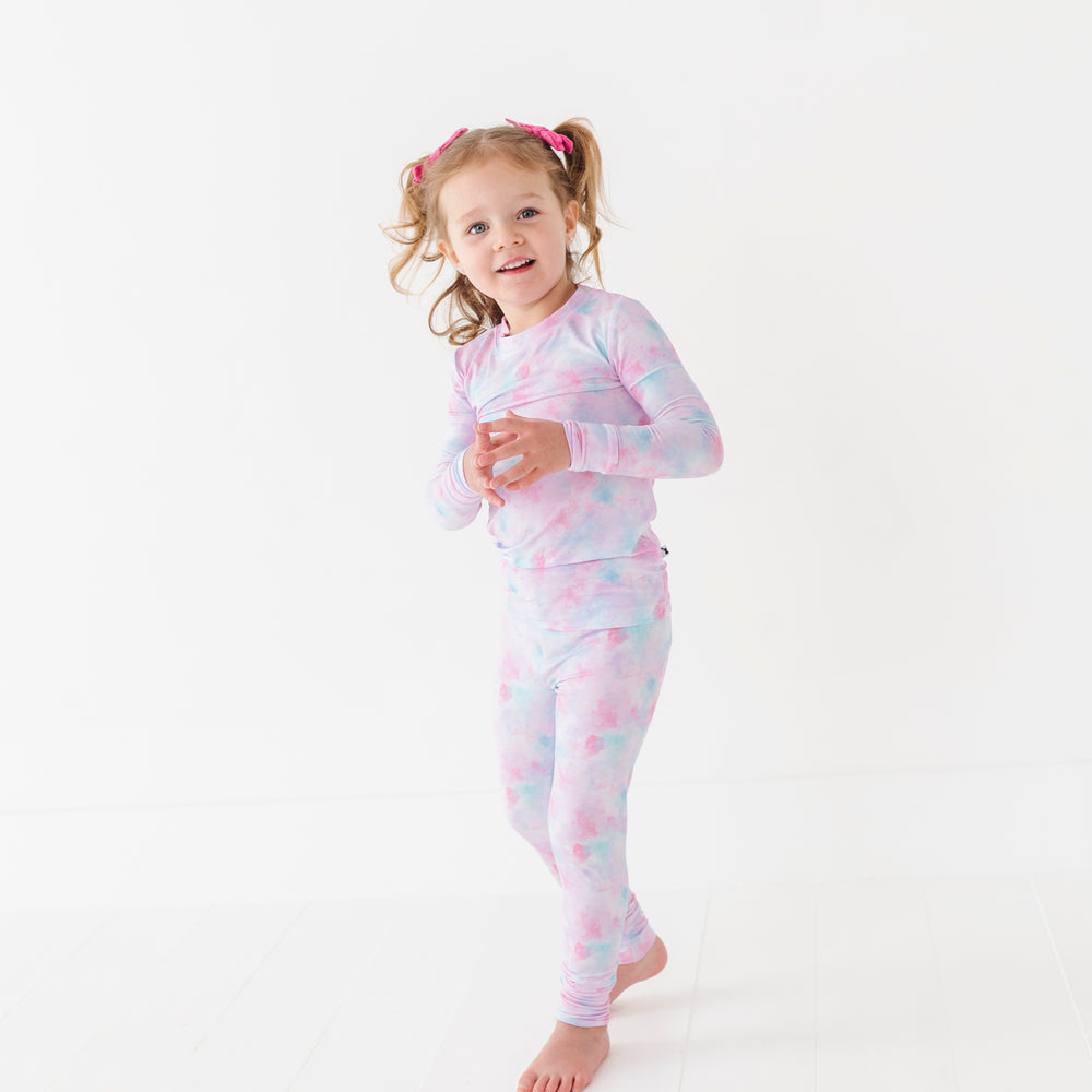 
                      
                        Girl in Tie Dye Pajamas by Kiki and Lulu
                      
                    