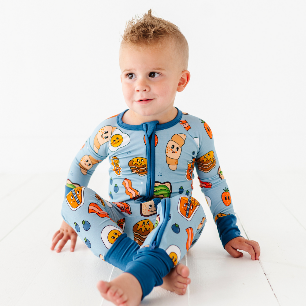 Baby in blue breakfast pajamas