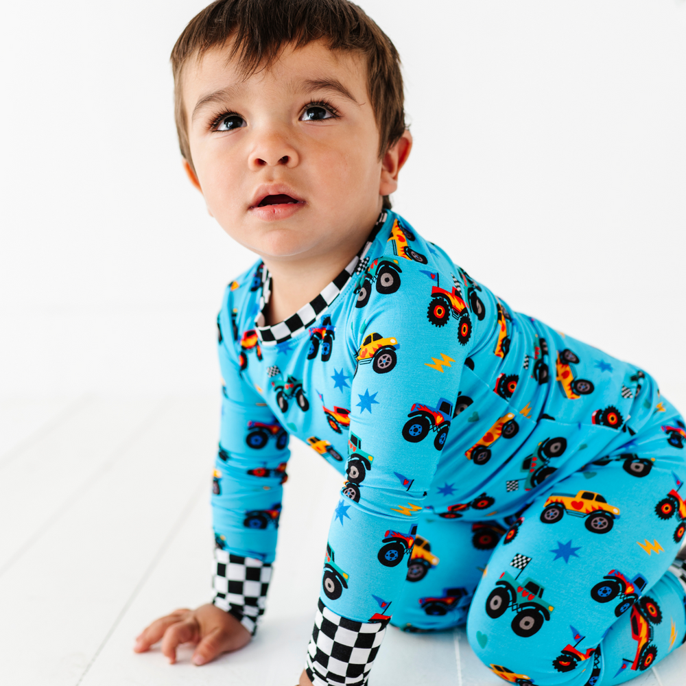 
                      
                        Boy in monster truck pajamas by Kiki and Lulu
                      
                    