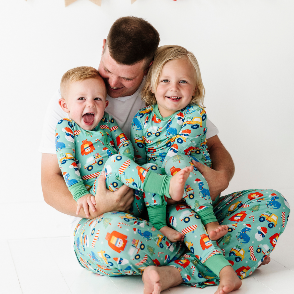 
                      
                        Toddler in Blue Christmas pajamas by Kiki and Lulu
                      
                    