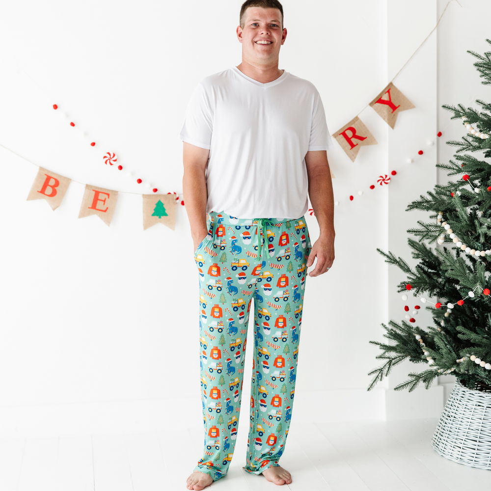 
                
                    Load image into Gallery viewer, Man in Christmas Pajama bottoms by Kiki and Lulu
                
            
